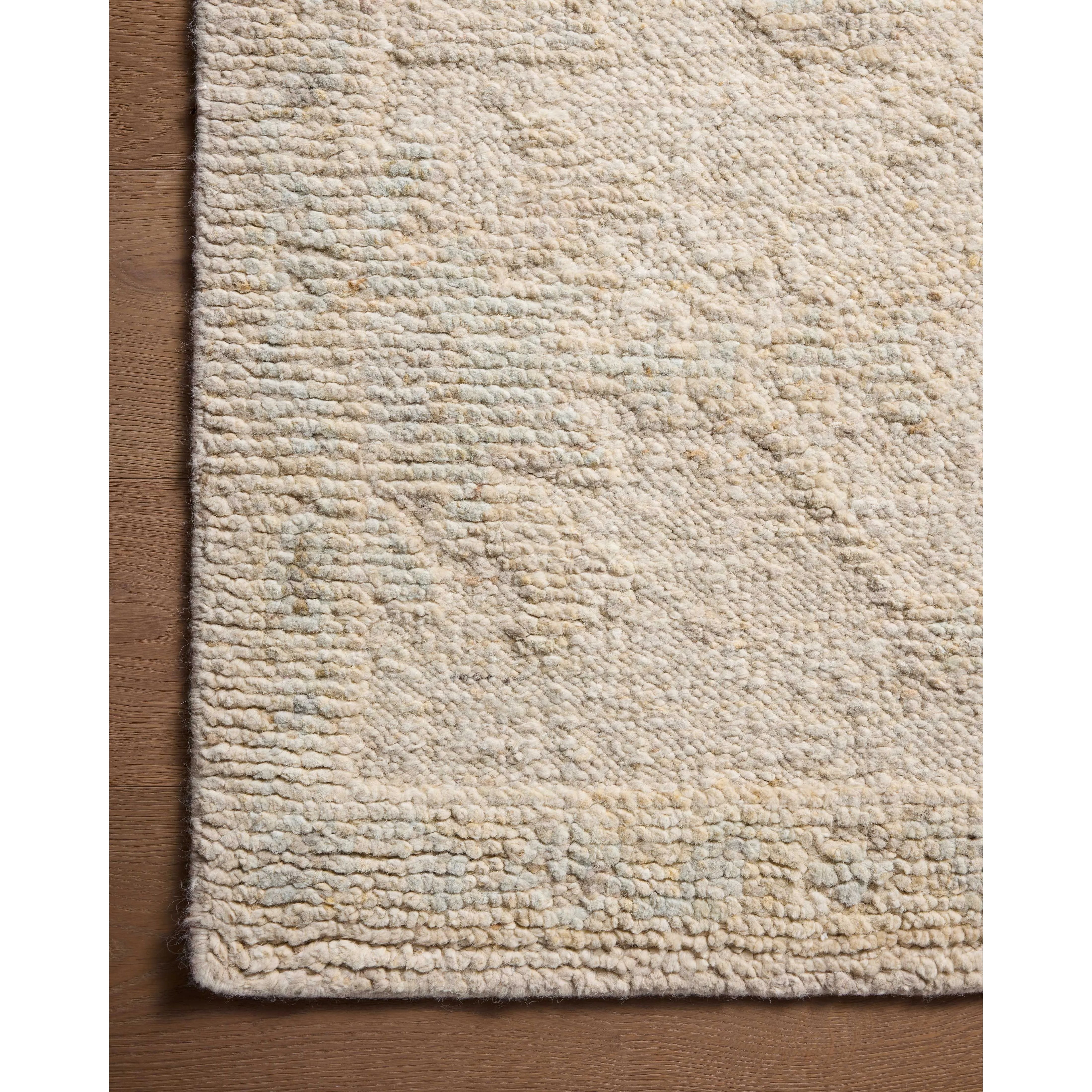 Featuring Adelaide Ivory / Natural Hand-Knotted Rug by Loloi at Amethyst Home. The Adelaide Collection is a cool-toned area rug with asymmetrical motifs that float across the soft wool surface. Restrained in color and dynamic in texture, Adelaideâ€™s variable pile height adds subtle dimension as the light changes throughout the day. Hand-knotted by artisan. Amethyst Home provides interior design, new home construction design consulting, vintage area rugs, and lighting in the Scottsdale metro area.