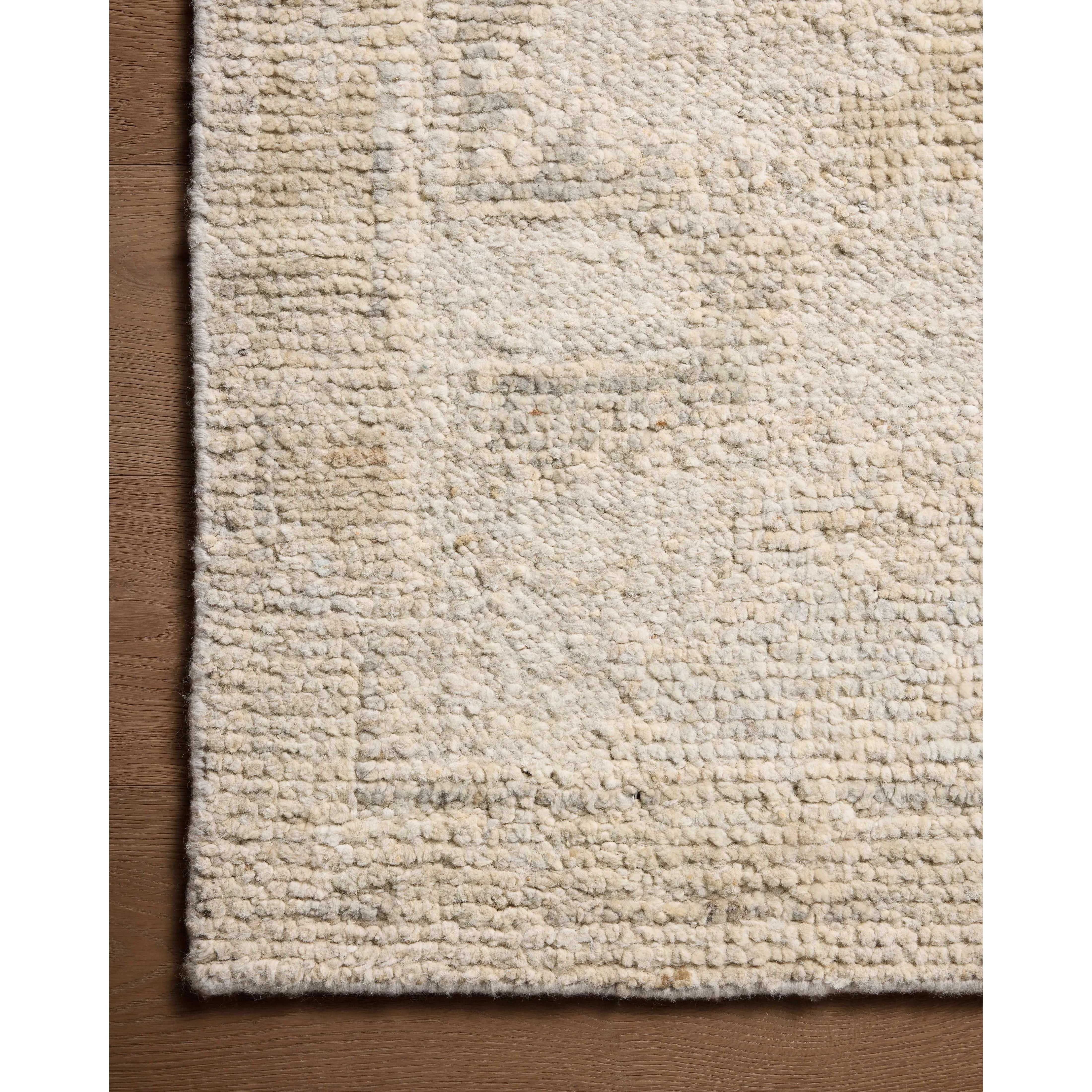 Featuring Adelaide Pepple / Wheat Hand-Knotted Rug by Loloi at Amethyst Home. The Adelaide Collection is a cool-toned area rug with asymmetrical motifs that float across the soft wool surface. Restrained in color and dynamic in texture, Adelaideâ€™s variable pile height adds subtle dimension as the light changes throughout the day. Hand-knotted by artisans . Amethyst Home provides interior design, new home construction design consulting, vintage area rugs, and lighting in the Nashville metro area.