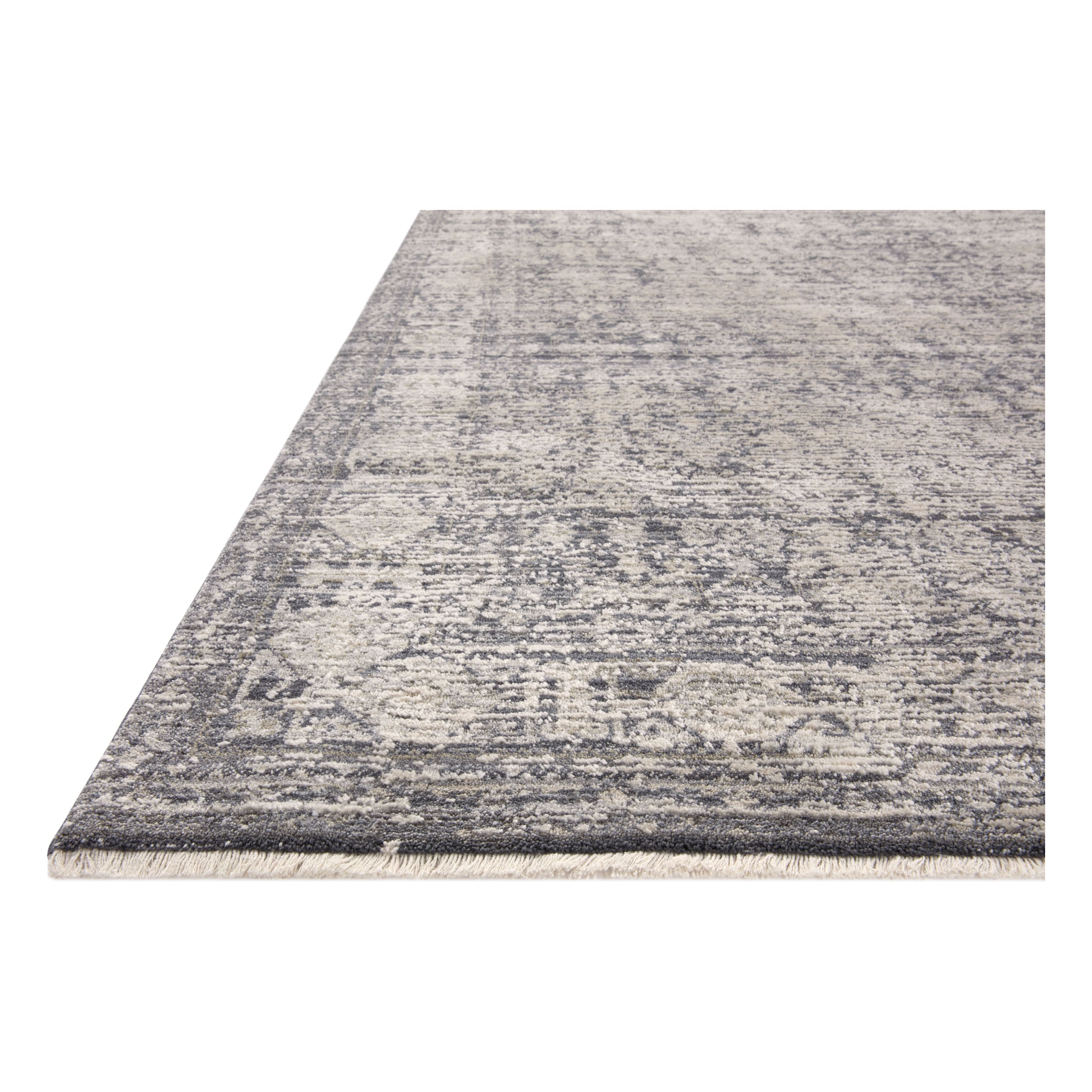 Amber Lewis x Loloi Alie Charcoal / Dove Rug have an elevated antique look and plush, modern feel. The rug’s underlying traditional motif is overlaid with a slightly higher pile that creates a softening effect like early morning fog. Amethyst Home provides interior design services, furniture, rugs, and lighting in the Dallas metro area.