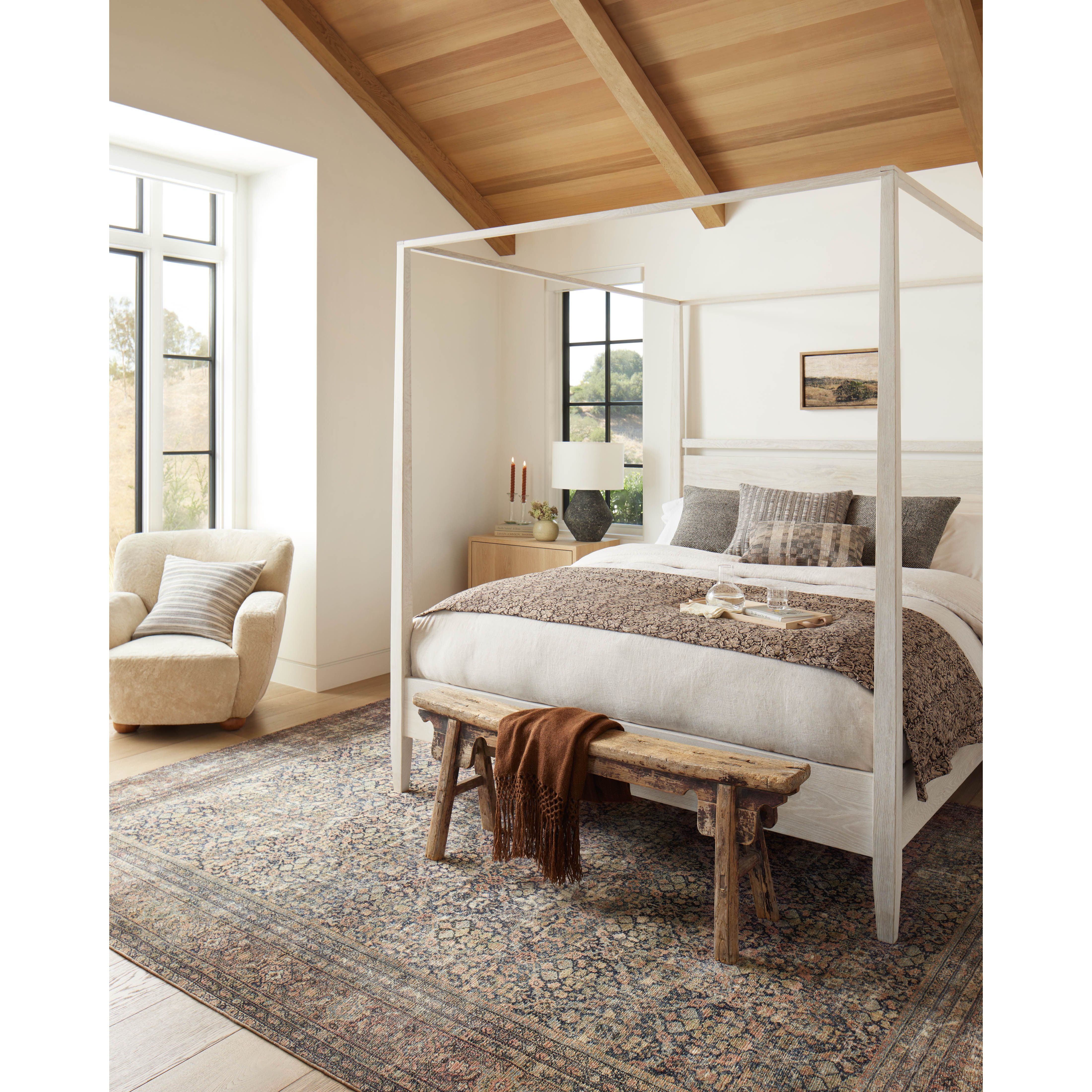 With the faded feel of an antique rug, the Amber Lewis x Loloi Morgan Denim / Multi Rug is a feat of modern printed construction. These impressive area rugs expertly blend sophisticated tones to recreate the dynamic colors of a vintage textiles. Power-loomed of CloudPile™ construction, these rugs are extra-soft to walk upon yet still durable for high-traffic rooms. Amethyst Home provides interior design services, furniture, rugs, and lighting in the Austin metro area.
