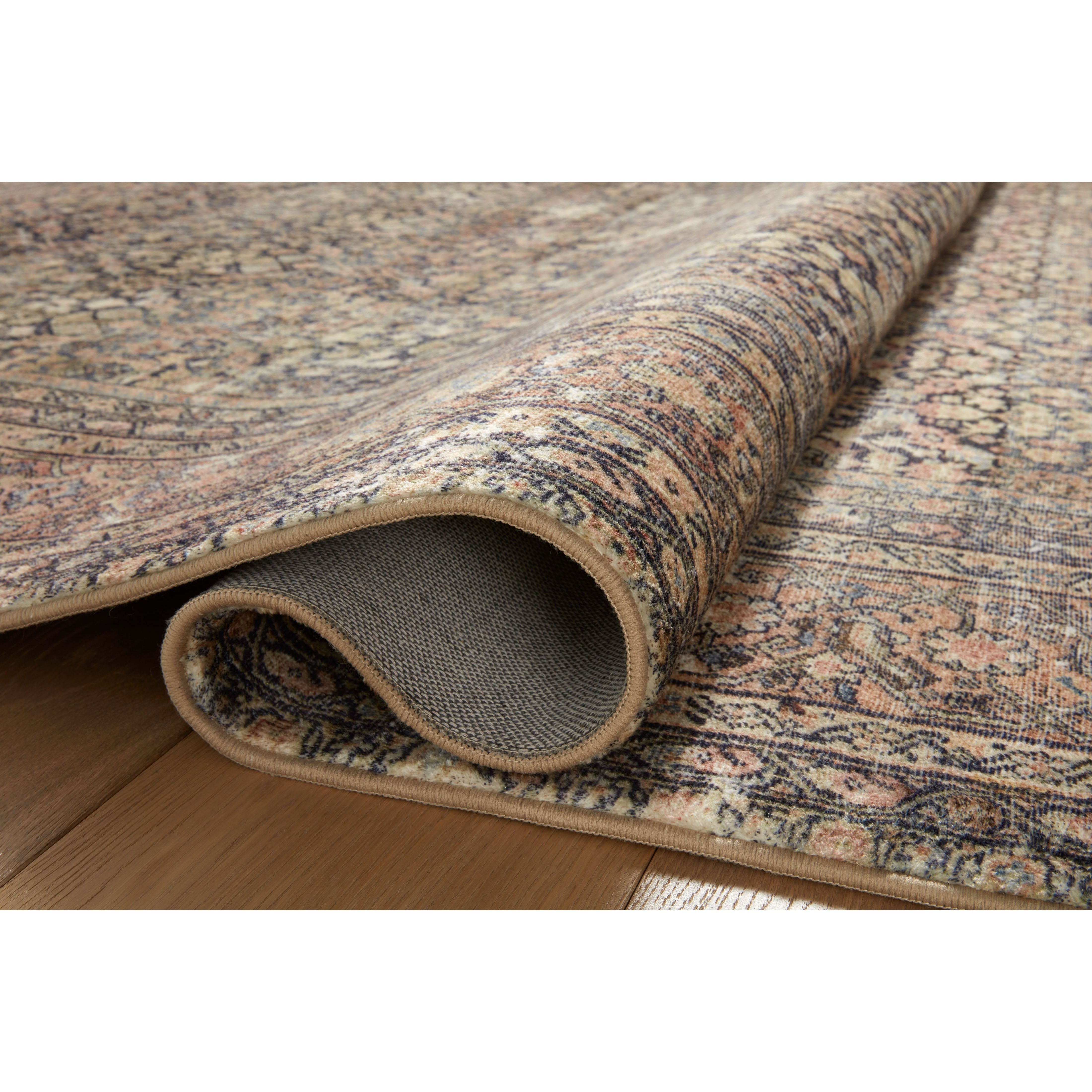 With the faded feel of an antique rug, the Amber Lewis x Loloi Morgan Denim / Multi Rug is a feat of modern printed construction. These impressive area rugs expertly blend sophisticated tones to recreate the dynamic colors of a vintage textiles. Power-loomed of CloudPile™ construction, these rugs are extra-soft to walk upon yet still durable for high-traffic rooms. Amethyst Home provides interior design services, furniture, rugs, and lighting in the Omaha metro area.