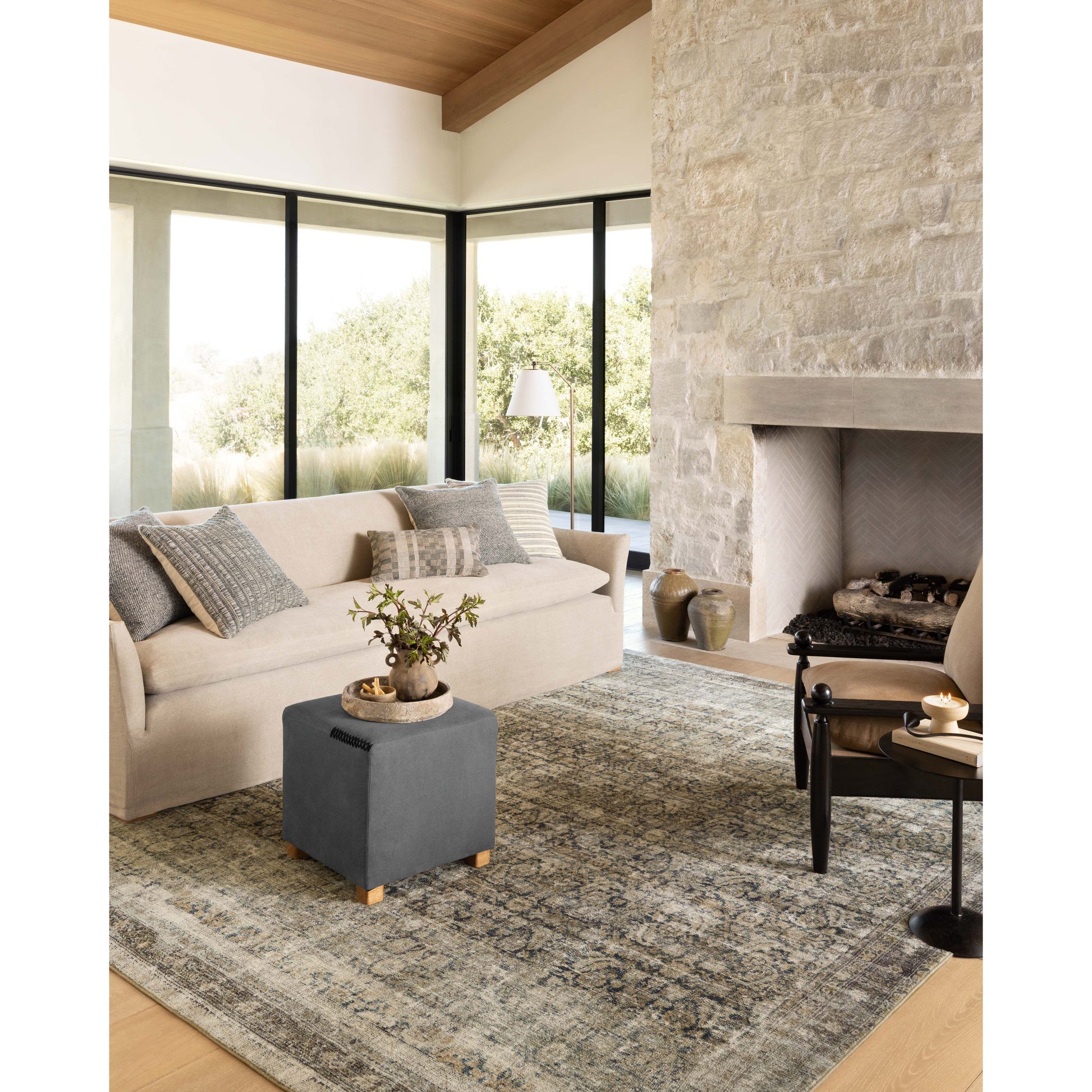 With the faded feel of an antique rug, the Amber Lewis x Loloi Morgan Navy / Sand Rug is a feat of modern printed construction. These impressive area rugs expertly blend sophisticated tones to recreate the dynamic colors of a vintage textiles. Power-loomed of CloudPile™ construction, these rugs are extra-soft to walk upon yet still durable for high-traffic rooms. Amethyst Home provides interior design services, furniture, rugs, and lighting in the Des Moines metro area.