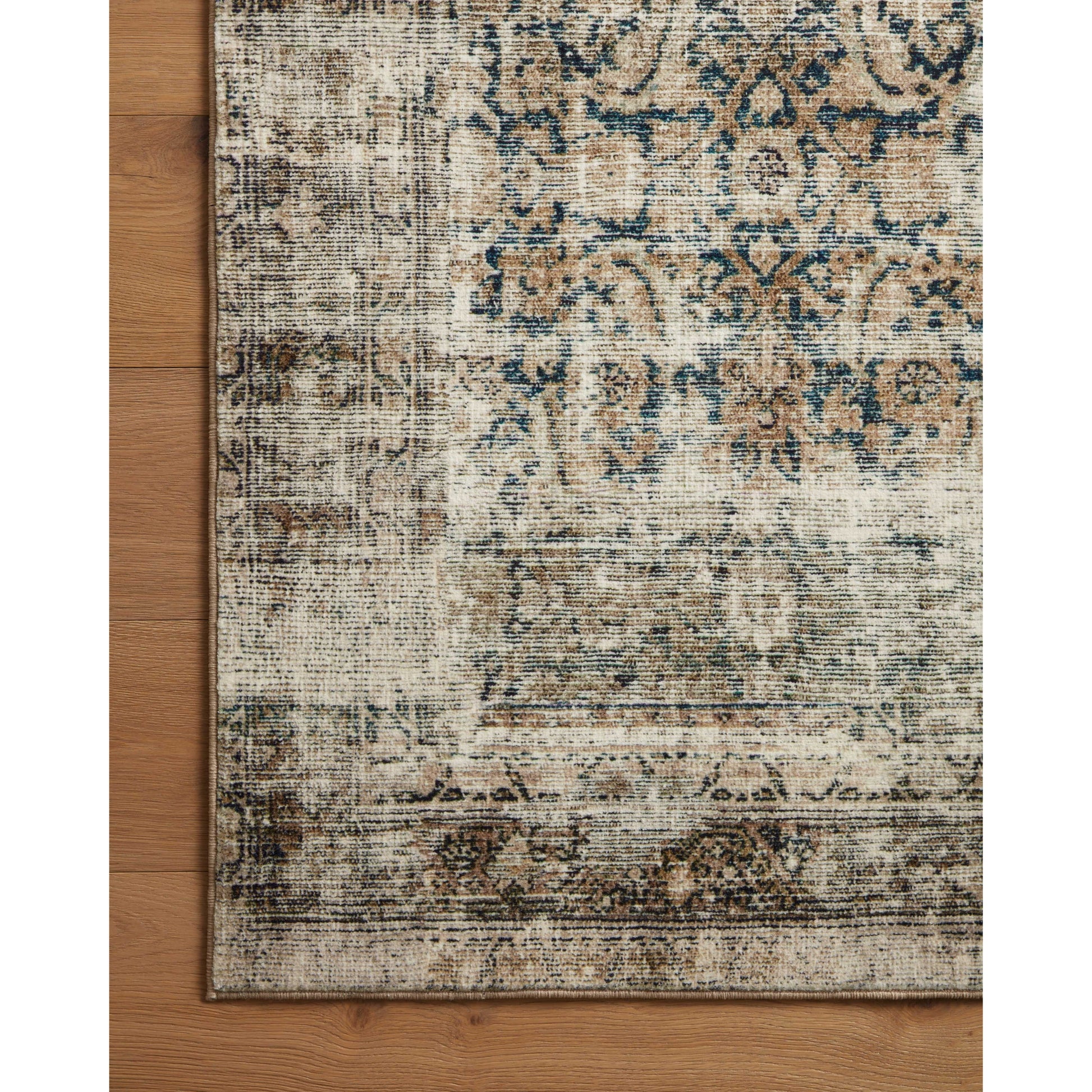 With the faded feel of an antique rug, the Amber Lewis x Loloi Morgan Navy / Sand Rug is a feat of modern printed construction. These impressive area rugs expertly blend sophisticated tones to recreate the dynamic colors of a vintage textiles. Power-loomed of CloudPile™ construction, these rugs are extra-soft to walk upon yet still durable for high-traffic rooms. Amethyst Home provides interior design services, furniture, rugs, and lighting in the Monterey metro area.