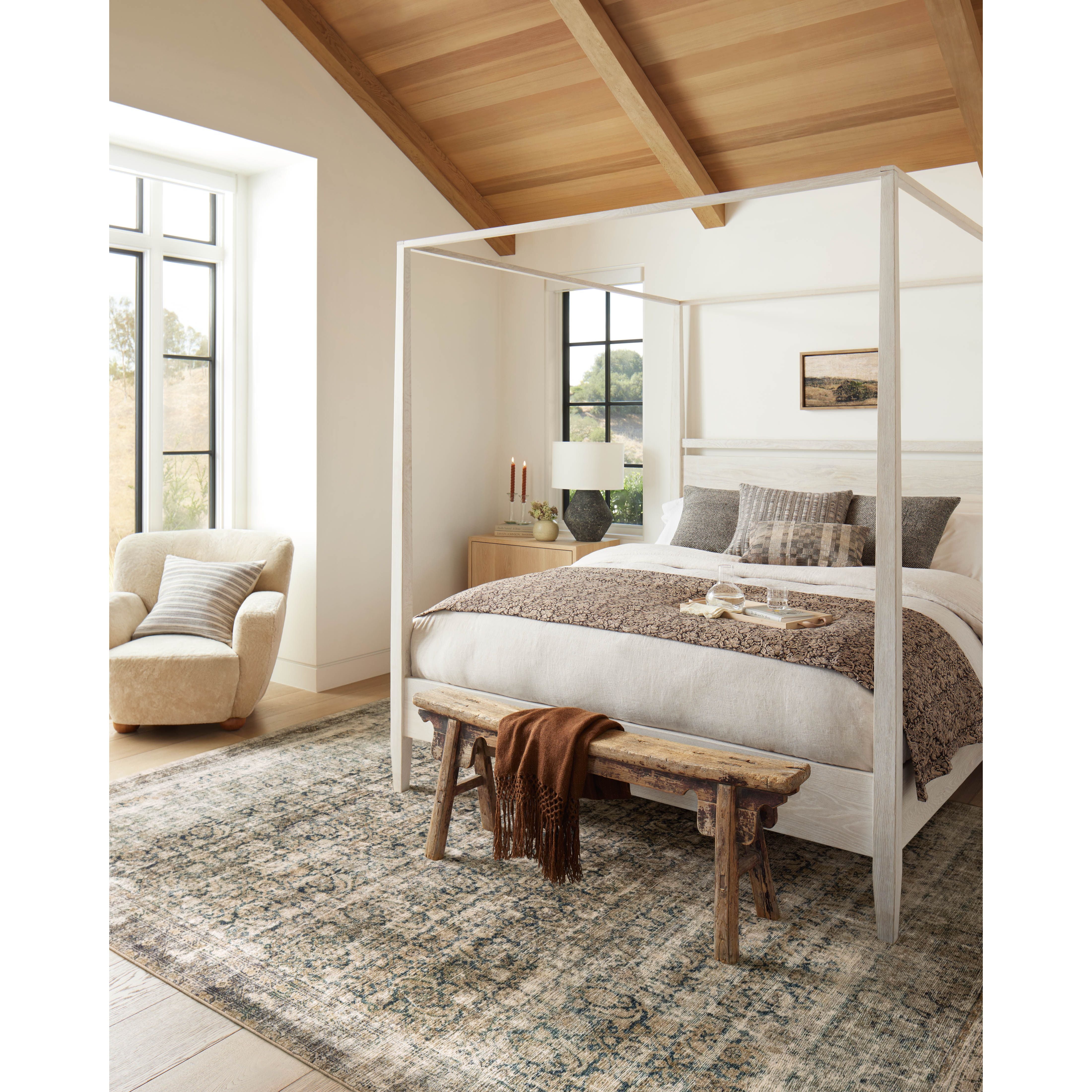 With the faded feel of an antique rug, the Amber Lewis x Loloi Morgan Navy / Sand Rug is a feat of modern printed construction. These impressive area rugs expertly blend sophisticated tones to recreate the dynamic colors of a vintage textiles. Power-loomed of CloudPile™ construction, these rugs are extra-soft to walk upon yet still durable for high-traffic rooms. Amethyst Home provides interior design services, furniture, rugs, and lighting in the Omaha metro area.