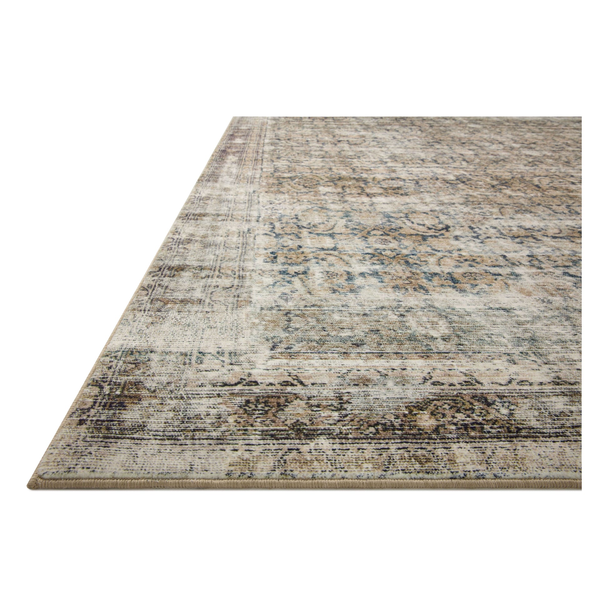 With the faded feel of an antique rug, the Amber Lewis x Loloi Morgan Navy / Sand Rug is a feat of modern printed construction. These impressive area rugs expertly blend sophisticated tones to recreate the dynamic colors of a vintage textiles. Power-loomed of CloudPile™ construction, these rugs are extra-soft to walk upon yet still durable for high-traffic rooms. Amethyst Home provides interior design services, furniture, rugs, and lighting in the Seattle metro area.