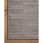 Sleek and modern, the Lou Collection is a luxurious hand-loomed area rug by Amber Lewis x Loloi. While the rug presents a minimal aesthetic, up close, it has a broken stripe pattern that creates a slightly ribbed effect. It’s made with a blend of wool and viscose that’s soft and durable, an elevated neutral for any room. Amethyst Home provides interior design, new home construction design consulting, vintage area rugs, and lighting in the Charlotte metro area.