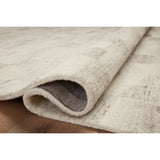 Featuring Amber Lewis x Loloi Rocky Ivory / Silver Rug by Loloi at Amethyst Home. The Rocky Collection area rug by Amber Lewis x Loloi is uniquely hand-tufted with undyed wool to create a subtle and natural color contrast. With a medium pile and neutral palette, the Rocky Collection can be a refreshing foundation in living rooms, bedrooms, and dens. The r. Amethyst Home provides interior design, new home construction design consulting, vintage area rugs, and lighting in the Kansas City metro area.