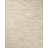 The Rocky Collection area rug by Amber Lewis x Loloi is uniquely hand-tufted with undyed wool to create a subtle and natural color contrast. With a medium pile and neutral palette, the Rocky Collection can be a refreshing foundation in living rooms, bedrooms, and dens. Amethyst Home provides interior design, new home construction design consulting, vintage area rugs, and lighting in the Newport Beach metro area.