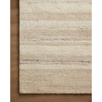 Featuring Amber Lewis x Loloi Rocky Natural / Sand Rug by Loloi at Amethyst Home. The Rocky Collection area rug by Amber Lewis x Loloi is uniquely hand-tufted with undyed wool to create a subtle and natural color contrast. With a medium pile and neutral palette, the Rocky Collection can be a refreshing foundation in living rooms, bedrooms, and dens. The ru. Amethyst Home provides interior design, new home construction design consulting, vintage area rugs, and lighting in the Alpharetta metro area.