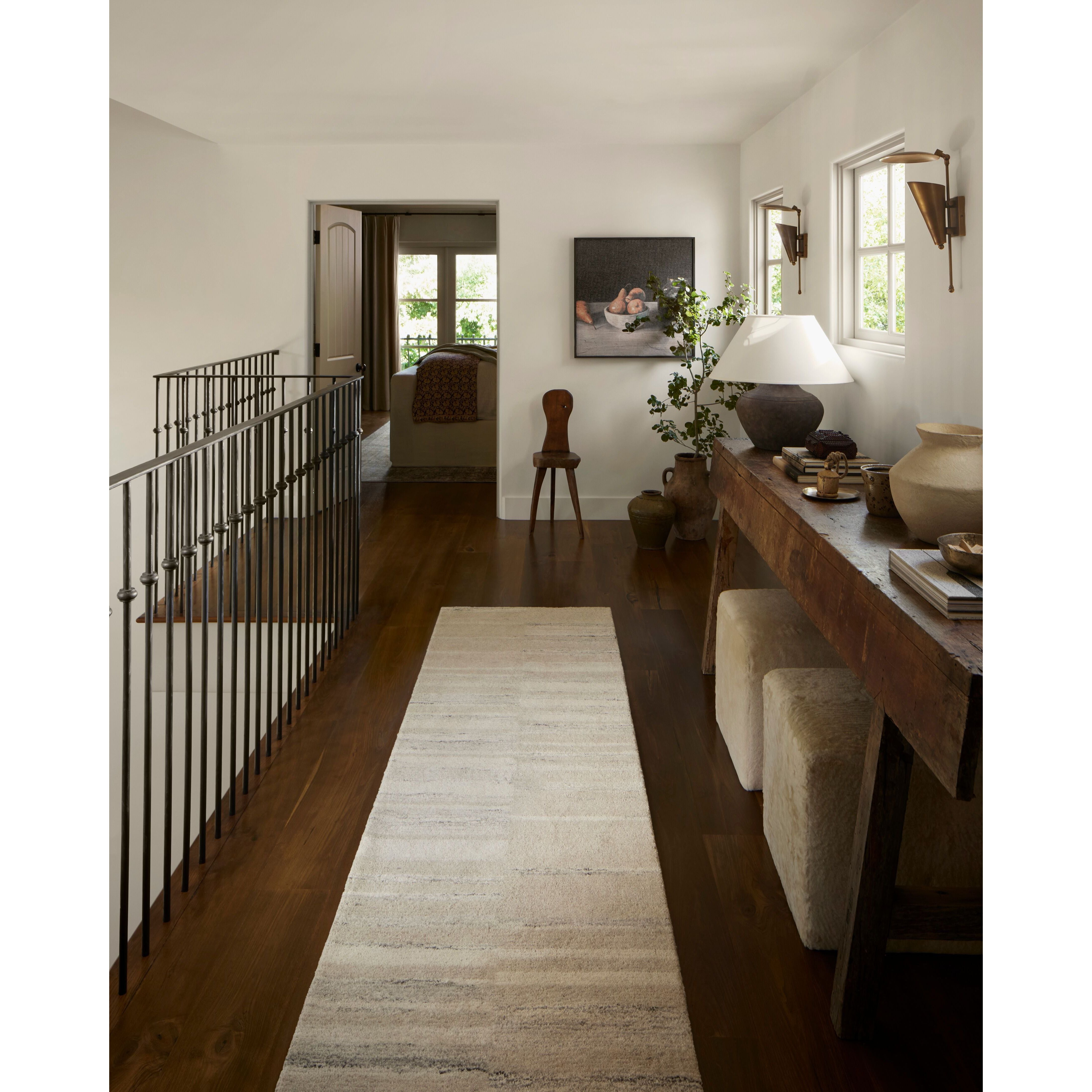Featuring Amber Lewis x Loloi Rocky Natural / Sand Rug by Loloi at Amethyst Home. The Rocky Collection area rug by Amber Lewis x Loloi is uniquely hand-tufted with undyed wool to create a subtle and natural color contrast. With a medium pile and neutral palette, the Rocky Collection can be a refreshing foundation in living rooms, bedrooms, and dens. The r. Amethyst Home provides interior design, new home construction design consulting, vintage area rugs, and lighting in the Los Angeles metro area.