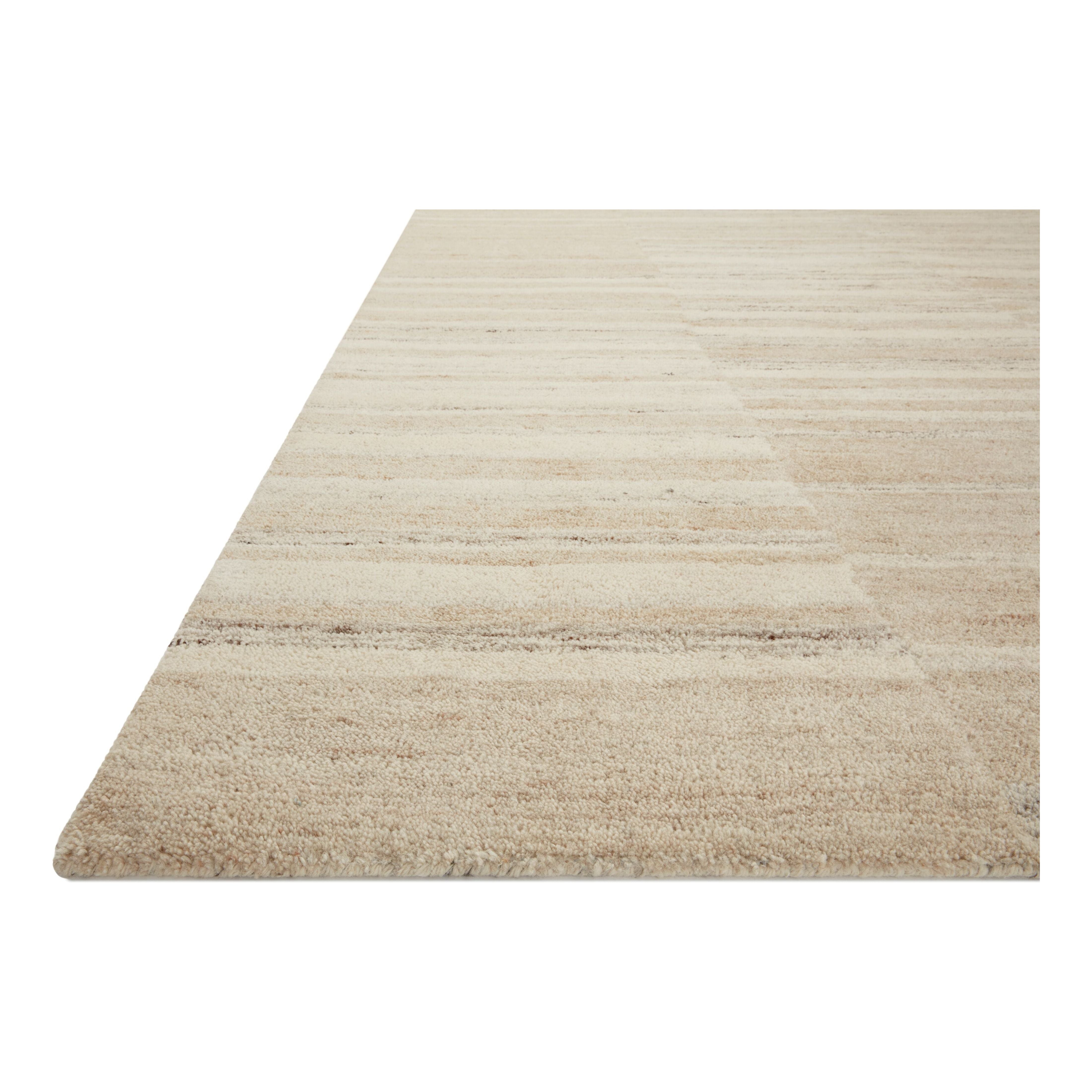 Featuring Amber Lewis x Loloi Rocky Natural / Sand Rug by Loloi at Amethyst Home. The Rocky Collection area rug by Amber Lewis x Loloi is uniquely hand-tufted with undyed wool to create a subtle and natural color contrast. With a medium pile and neutral palette, the Rocky Collection can be a refreshing foundation in living rooms, bedrooms, and dens. The rug. Amethyst Home provides interior design, new home construction design consulting, vintage area rugs, and lighting in the Nashville metro area.