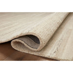Featuring Amber Lewis x Loloi Rocky Natural / Sand Rug by Loloi at Amethyst Home. The Rocky Collection area rug by Amber Lewis x Loloi is uniquely hand-tufted with undyed wool to create a subtle and natural color contrast. With a medium pile and neutral palette, the Rocky Collection can be a refreshing foundation in living rooms, bedrooms, and dens. The ru. Amethyst Home provides interior design, new home construction design consulting, vintage area rugs, and lighting in the Scottsdale metro area.
