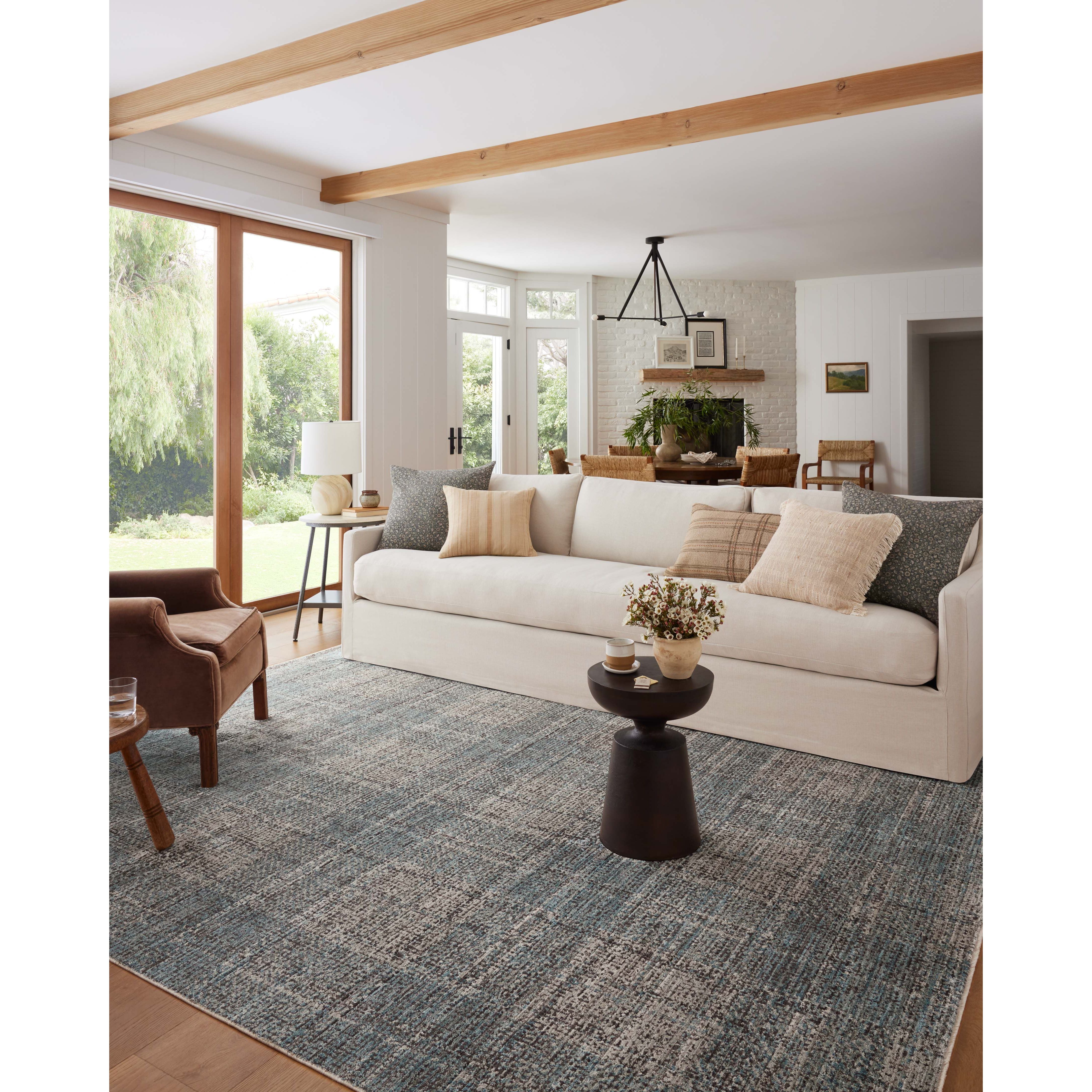 Featuring Angela Rose x Loloi Ember Denim / Charcoal Rug by Loloi at Amethyst Home. The Ember Denim / Charcoal rug by Angela Rose x Loloi is a modern flatweave area rug with a timeless plaid pattern that adds depth and coziness to any living room, bedroom, dining room, or hallway. Ember is power-loomed of 100% space-dyed polyester, a durable construction th. Amethyst Home provides interior design, new home construction design consulting, vintage area rugs, and lighting in the Calabasas metro area.