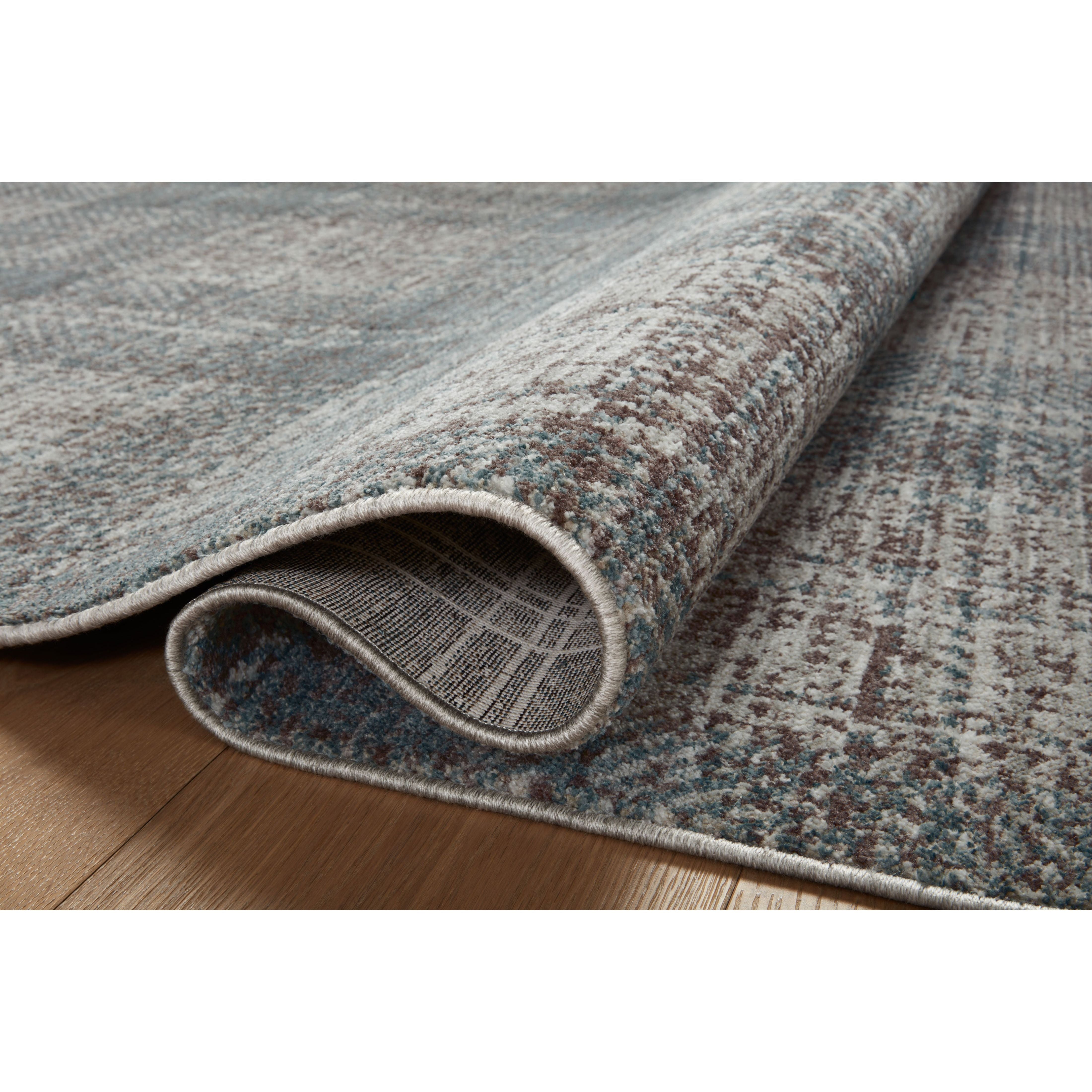 The Ember Collection by Angela Rose x Loloi is a modern flatweave area rug with a timeless plaid pattern that adds depth and coziness to any living room, bedroom, dining room, or hallway. Ember is power-loomed of 100% space-dyed polyester, a durable construction that creates a nuanced depth of color, available in a range of neutral palettes. Amethyst Home provides interior design, new home construction design consulting, vintage area rugs, and lighting in the San Diego metro area.