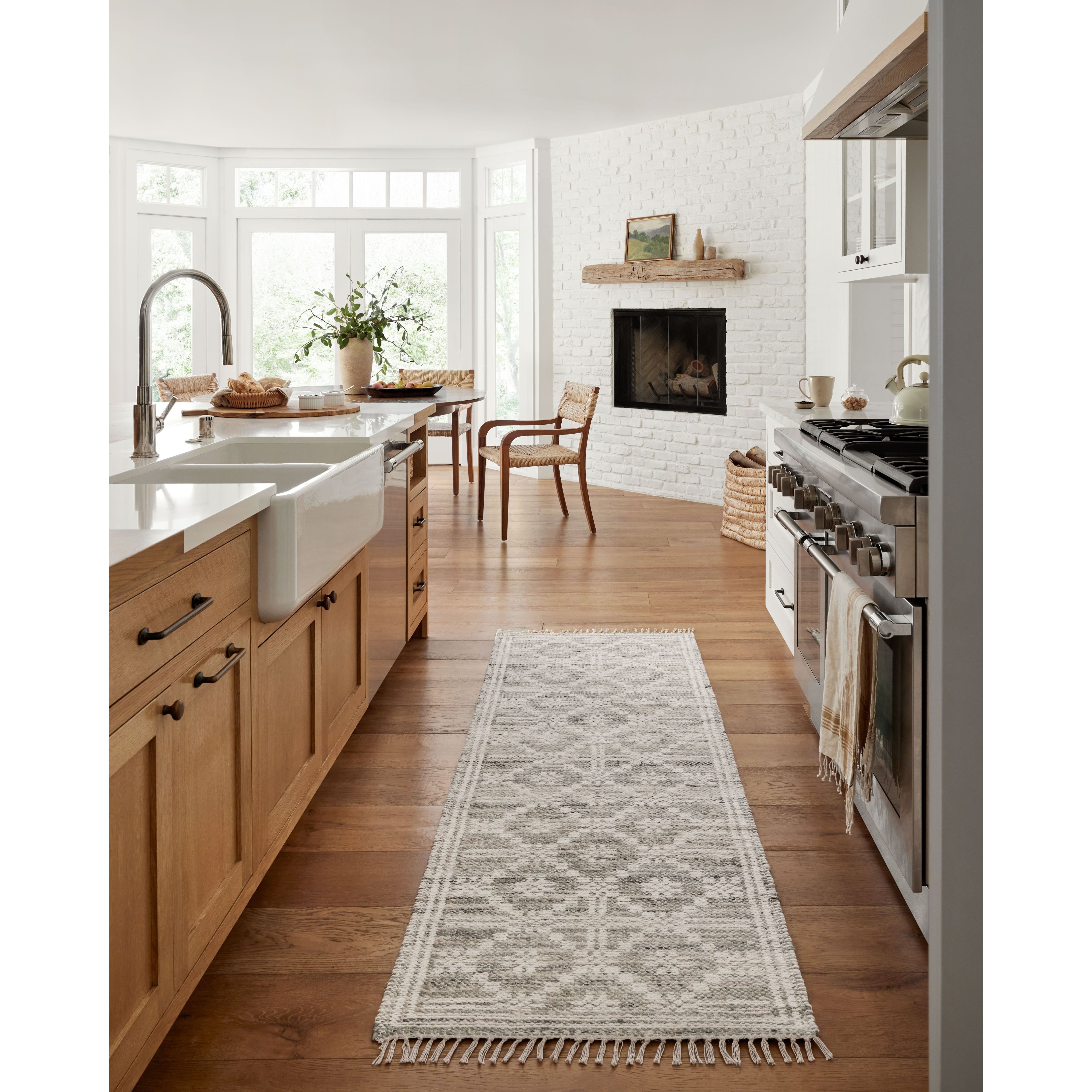 Featuring Angela Rose x Loloi Rivers Lagoon / Ivory Rug by Loloi at Amethyst Home. The Rivers Lagoon / Ivory rug by Angela Rose x Loloi is a modern flatweave area rug with a reversible design featuring symmetrical motifs. Woven of wool, cotton, and jute, Rivers combines natural materials with an airy, natural aesthetic. The soft colors of the rug create a w. Amethyst Home provides interior design, new home construction design consulting, vintage area rugs, and lighting in the Charlotte metro area.