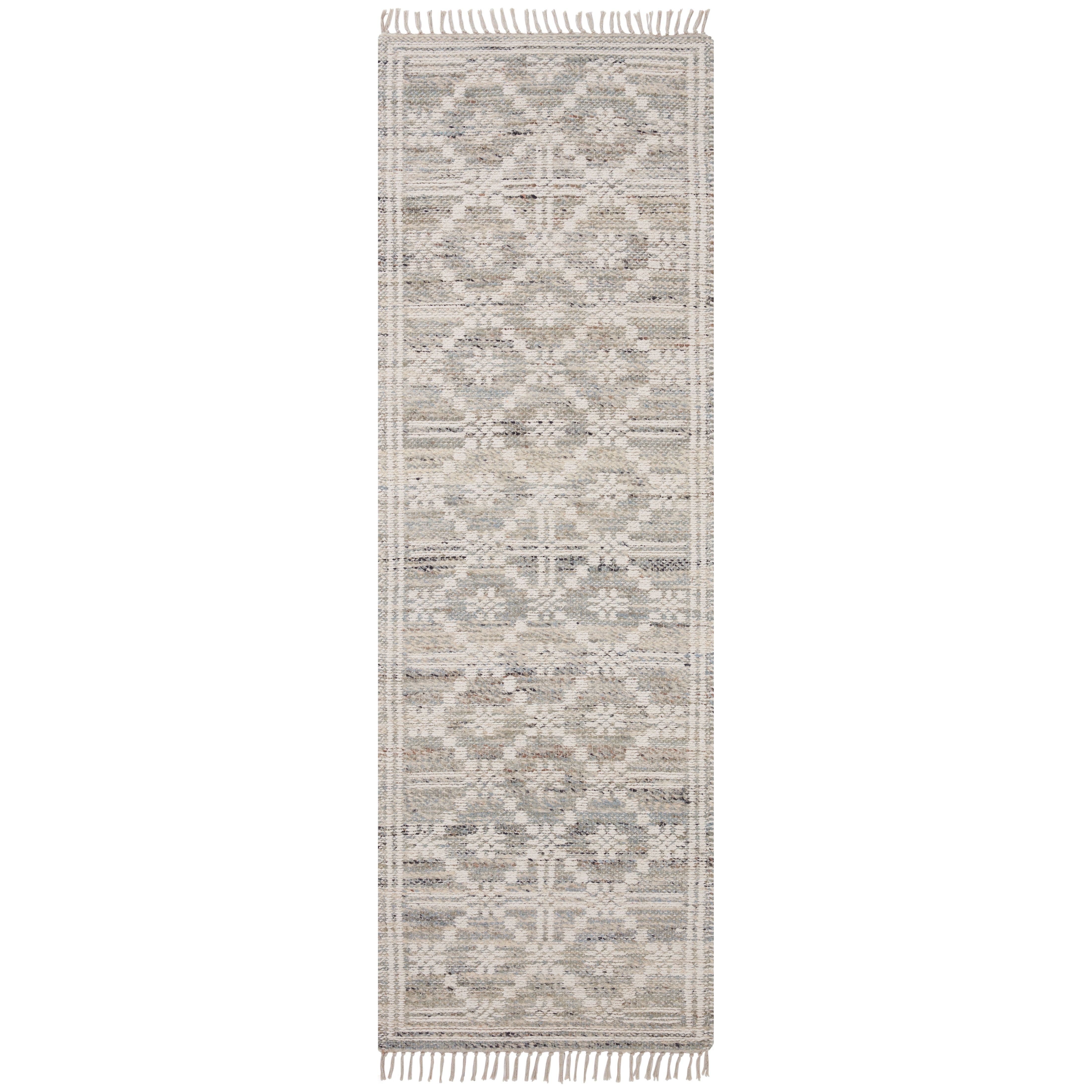 The Rivers Collection by Angela Rose x Loloi is a modern flatweave area rug with a reversible design featuring symmetrical motifs. Woven of wool, cotton, and jute, Rivers combines natural materials with an airy, natural aesthetic. The soft colors of the rug create a watercolor effect that adds artful depth to the neutral palette. Amethyst Home provides interior design, new home construction design consulting, vintage area rugs, and lighting in the Nashville metro area.