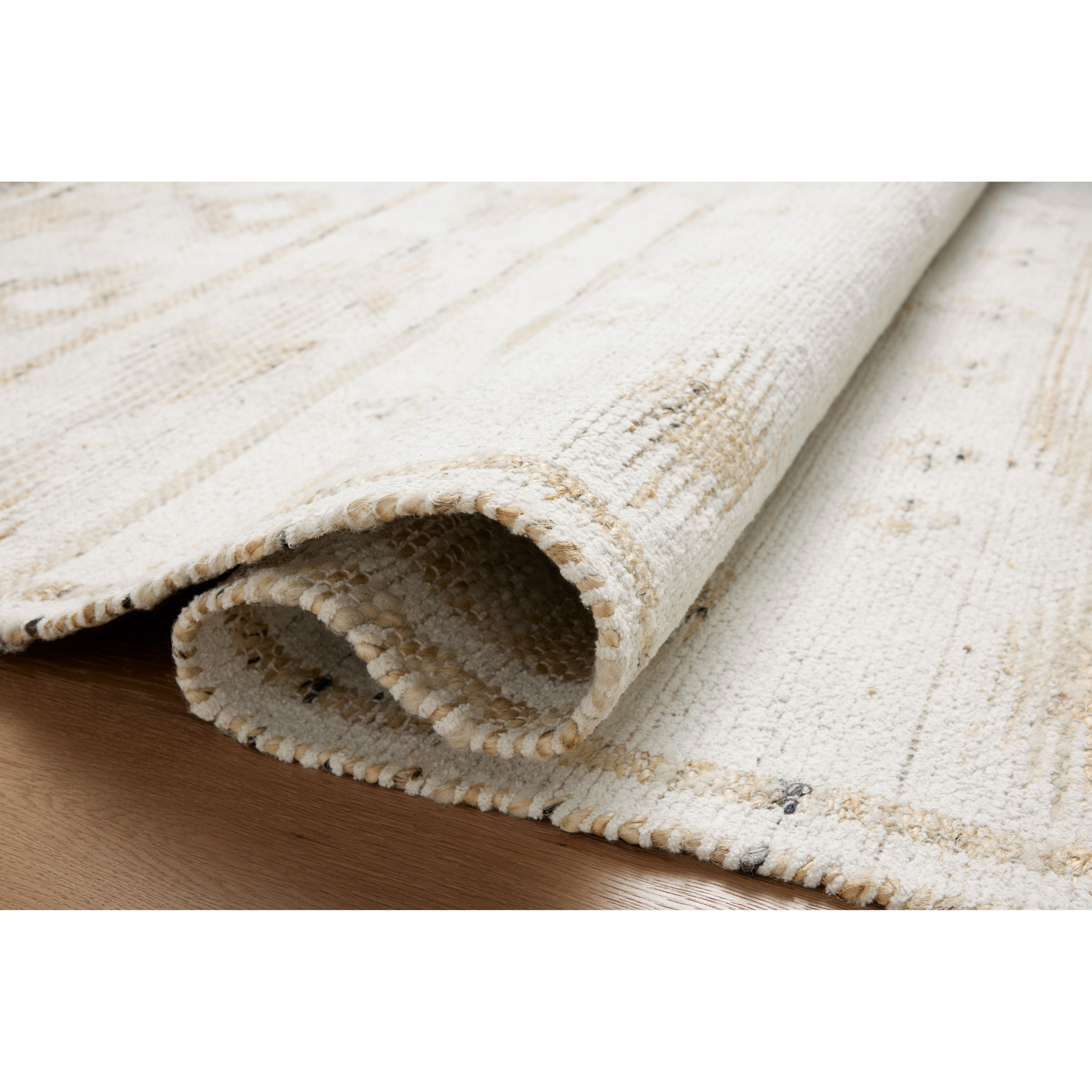 Featuring Angela Rose x Loloi Rivers Natural / Ivory Rug by Loloi at Amethyst Home. The Rivers Natural / Ivory rug by Angela Rose x Loloi is a modern flatweave area rug with a reversible design featuring symmetrical motifs. Woven of wool, cotton, and jute, Rivers combines natural materials with an airy, natural aesthetic. The soft colors of the rug create . Amethyst Home provides interior design, new home construction design consulting, vintage area rugs, and lighting in the Alpharetta metro area.