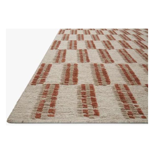 Featuring Carrier & Company x Loloi Harrison Beige / Rust Rug by Loloi at Amethyst Home. Inspired by Swedish weavings, the Harrison Collection for Carrier and Company x Loloi is a playful selection of high/low pile, where the patterns are expressed through the weaves. Linear patterns help create order and clarity in a room, and the repetition in the pattern. Amethyst Home provides interior design, new home construction design consulting, vintage area rugs, and lighting in the Nashville metro area.