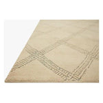 Featuring Carrier & Company x Loloi Milton Beige / Ocean Rug by Loloi at Amethyst Home. Made in collaboration with Carrier and Company x Loloi, the Milton Collection uses a banding detail to express the rich and plush pile. The addition of jute to the wool and cotton rugs creates a luxurious density that can be both seen and felt. As a simple border detail, a g. Amethyst Home provides interior design, new home construction design consulting, vintage area rugs, and lighting in the Miami metro area.