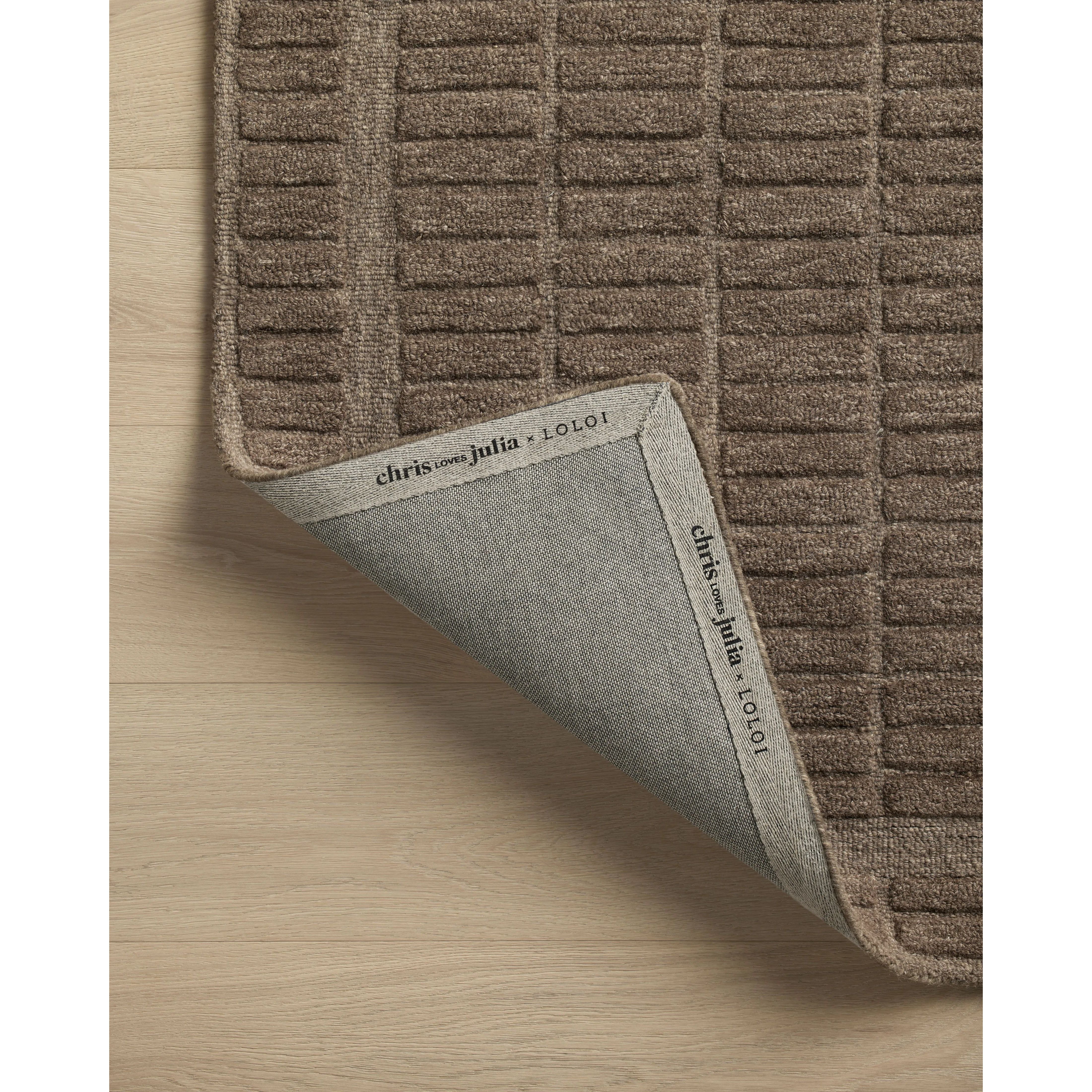 Featuring Chris Loves Julia x Loloi Bradley Cocoa / Cocoa Rug by Loloi at Amethyst Home. The Bradley Collection from Chris Loves Julia x Loloi takes the classic striped rug to new heights. This hand-tufted, 100% wool collection features two-toned linear patterns with alternating high-low pile. Bradley is GoodWeave-certified, ensuring our commitment to ethi. Amethyst Home provides interior design, new home construction design consulting, vintage area rugs, and lighting in the Des Moines metro area.
