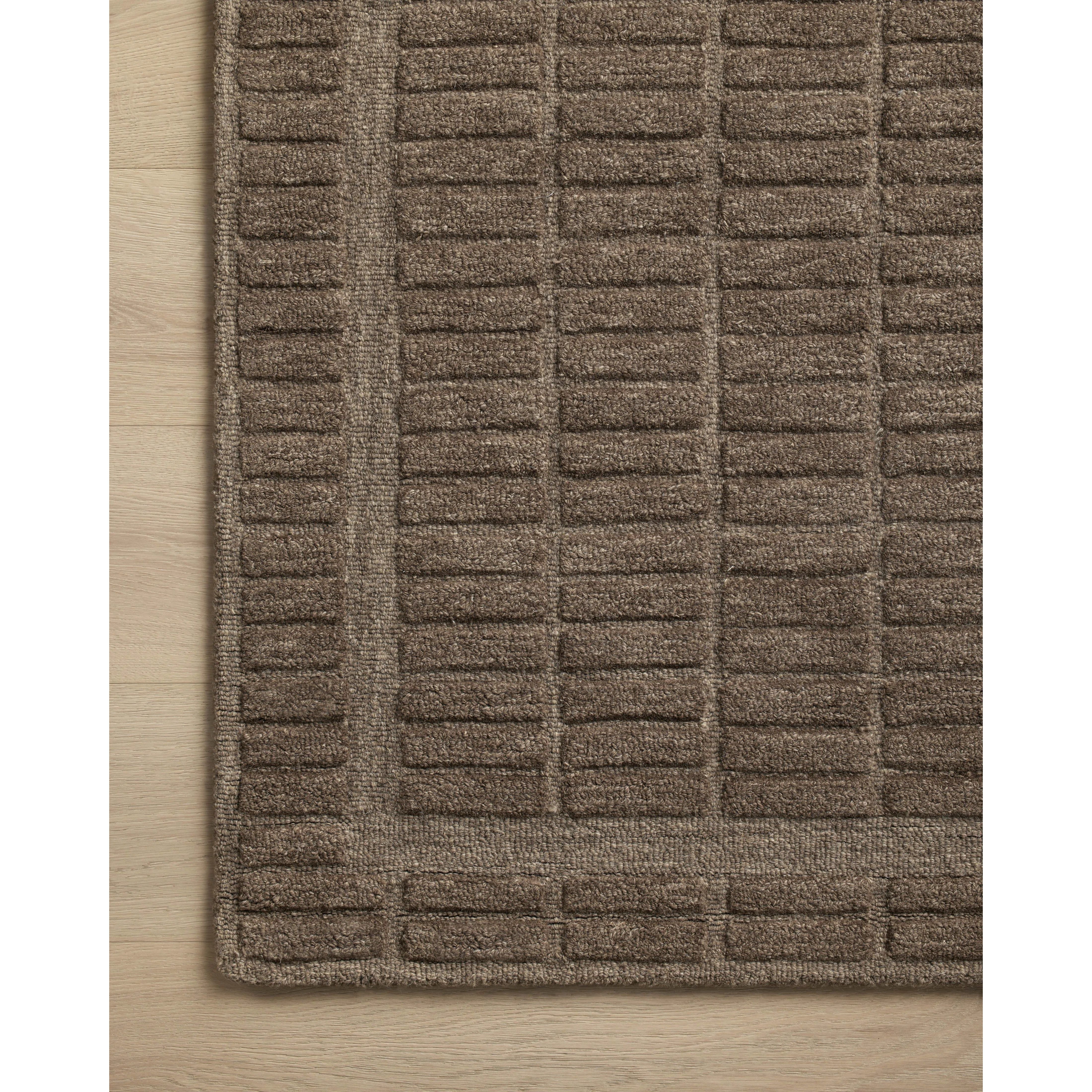 Featuring Chris Loves Julia x Loloi Bradley Cocoa / Cocoa Rug by Loloi at Amethyst Home. The Bradley Collection from Chris Loves Julia x Loloi takes the classic striped rug to new heights. This hand-tufted, 100% wool collection features two-toned linear patterns with alternating high-low pile. Bradley is GoodWeave-certified, ensuring our commitment to ethic. Amethyst Home provides interior design, new home construction design consulting, vintage area rugs, and lighting in the Nashville metro area.
