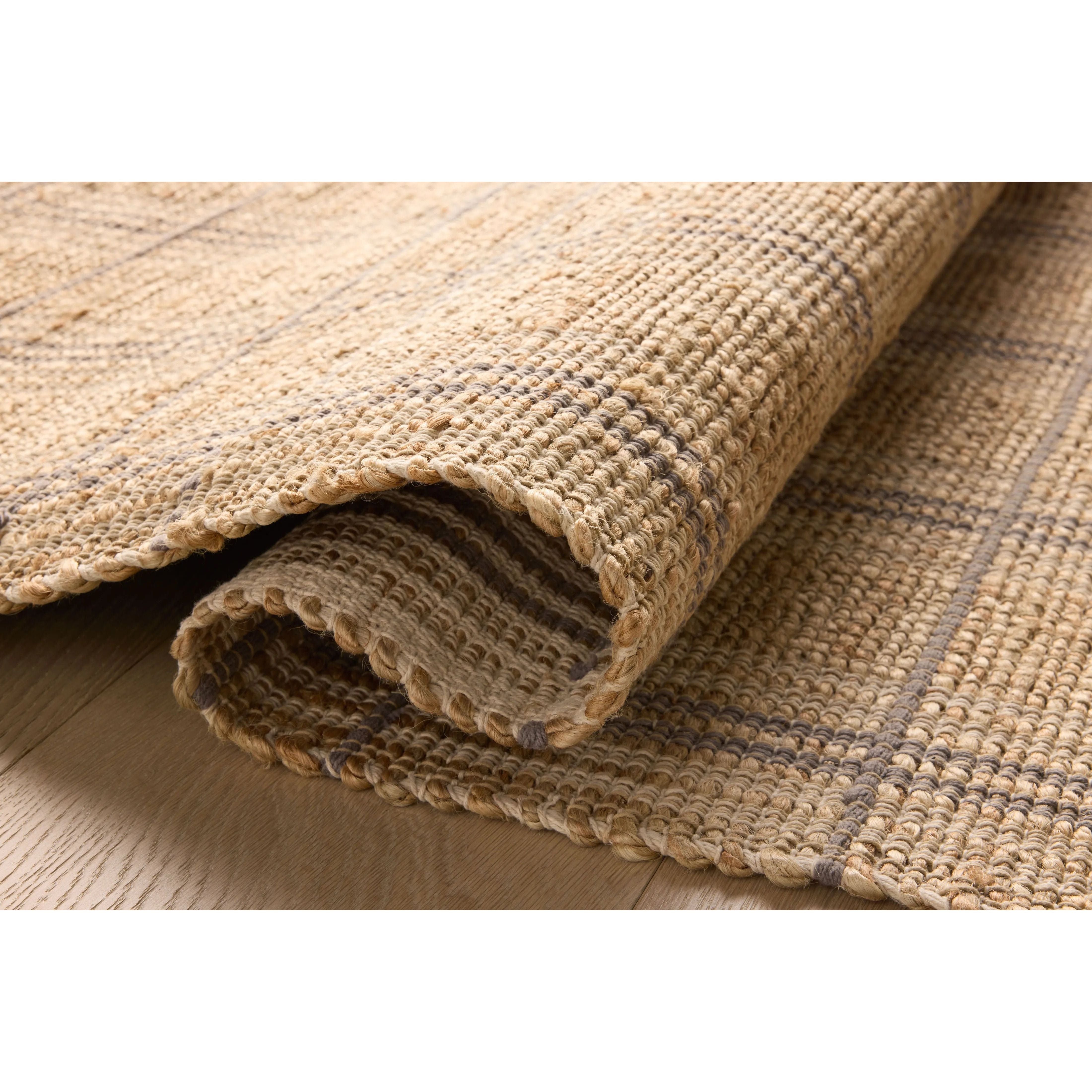 Featuring Chris Loves Julia x Loloi Judy Natural / Stone Rug by Loloi at Amethyst Home. Hand Woven76% Jute l 24% CottonJUD-02 Natural / StonePile Height: 0.5". Amethyst Home provides interior design, new home construction design consulting, vintage area rugs, and lighting in the Tampa metro area.
