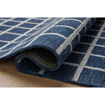 Featuring Chris Loves Julia x Loloi Polly Navy / Silver Rug by Loloi at Amethyst Home. Hand-tufted of wool and jute pile, the Polly collection for Chris Loves Julia x Loloi brings a fresh take on modern yet classic designs. With striking gridded designs toned down by a neutral color palette, Polly is a timeless choice for any room. Polly is also GoodWeave cert. Amethyst Home provides interior design, new home construction design consulting, vintage area rugs, and lighting in the Boston metro area.