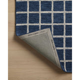 Featuring Chris Loves Julia x Loloi Polly Navy / Silver Rug by Loloi at Amethyst Home. Hand-tufted of wool and jute pile, the Polly collection for Chris Loves Julia x Loloi brings a fresh take on modern yet classic designs. With striking gridded designs toned down by a neutral color palette, Polly is a timeless choice for any room. Polly is also GoodWeave. Amethyst Home provides interior design, new home construction design consulting, vintage area rugs, and lighting in the Kansas City metro area.