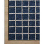 Featuring Chris Loves Julia x Loloi Polly Navy / Silver Rug by Loloi at Amethyst Home. Hand-tufted of wool and jute pile, the Polly collection for Chris Loves Julia x Loloi brings a fresh take on modern yet classic designs. With striking gridded designs toned down by a neutral color palette, Polly is a timeless choice for any room. Polly is also GoodWeave ce. Amethyst Home provides interior design, new home construction design consulting, vintage area rugs, and lighting in the Portland metro area.