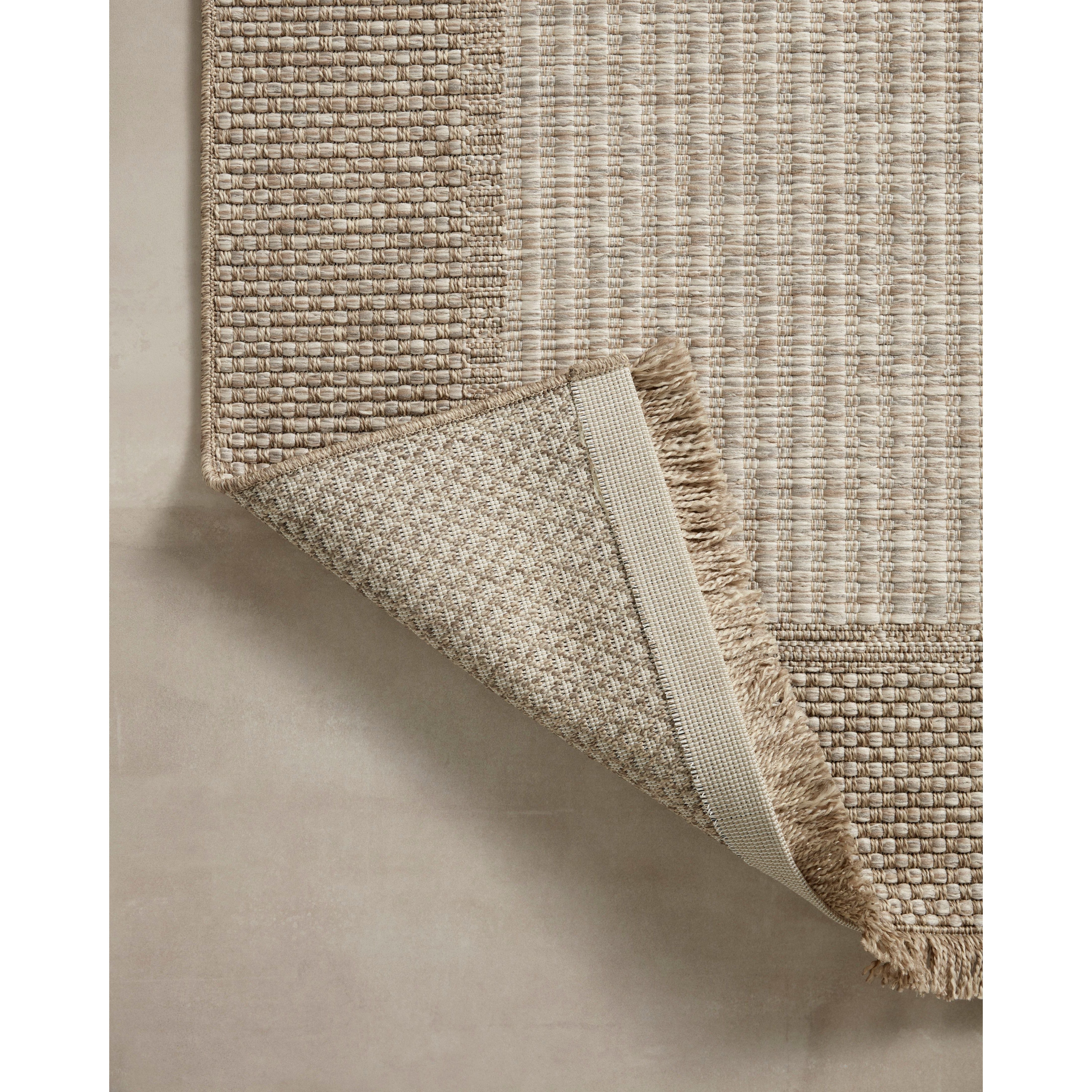 Made for sunny days ahead, the Dawn Collection is an indoor/outdoor rug that looks like a woven sisal rug but is power-loomed of 100% polypropylene, which makes it water- and mildew-resistant (so it's ready for rainy days ahead, too). Amethyst Home provides interior design, new home construction design consulting, vintage area rugs, and lighting in the Newport Beach metro area.