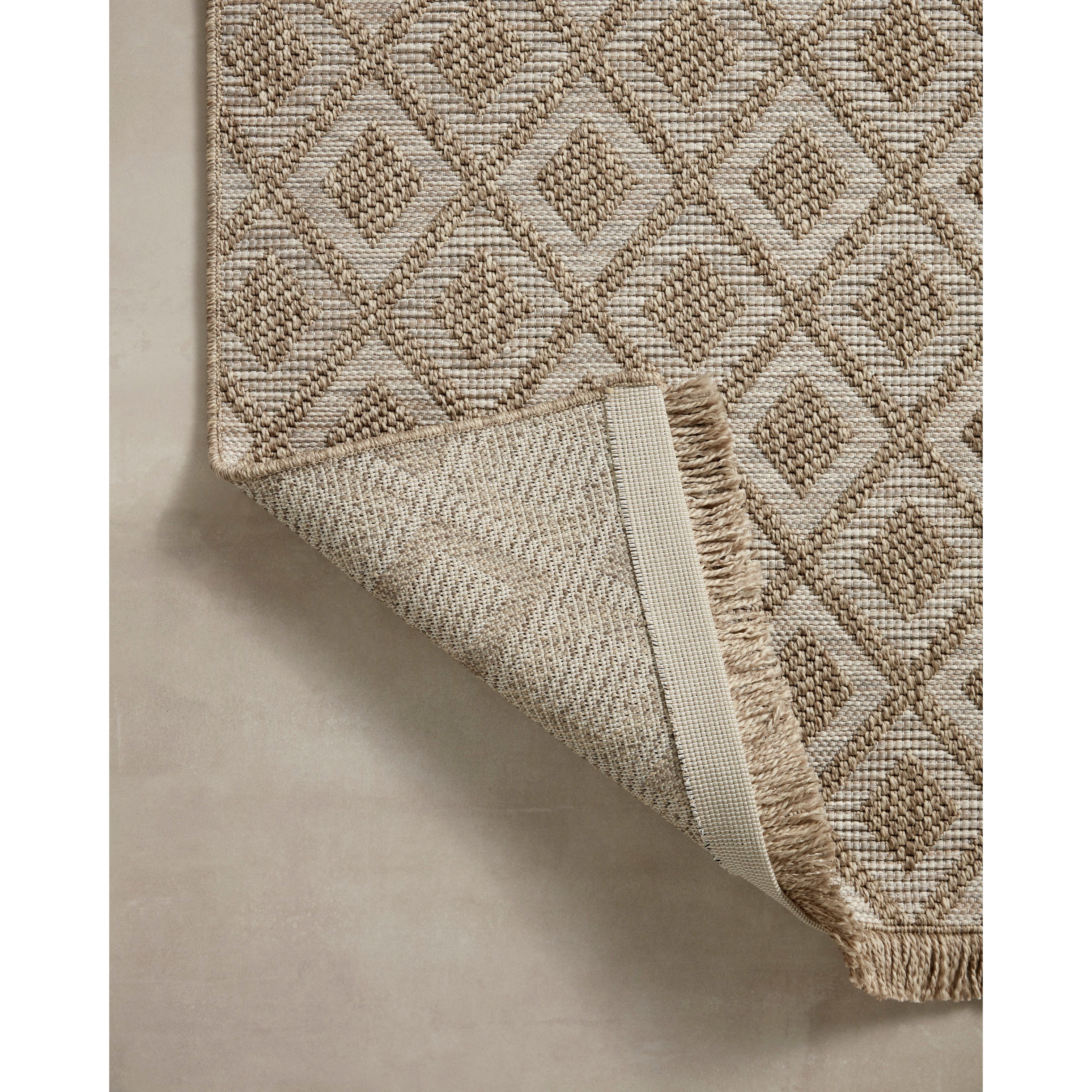 Featuring Dawn Natural DAW-07 Indoor/Outdoor Rug by Loloi at Amethyst Home. Made for sunny days ahead, the Dawn Collection is an indoor/outdoor rug that looks like a woven sisal rug but is power-loomed of 100% polypropylene, which makes it water- and mildew-resistant (so it's ready for rainy days ahead, too). Available in modern graphic patterns in tonal beige . Amethyst Home provides interior design, new home construction design consulting, vintage area rugs, and lighting in the Tampa metro area.
