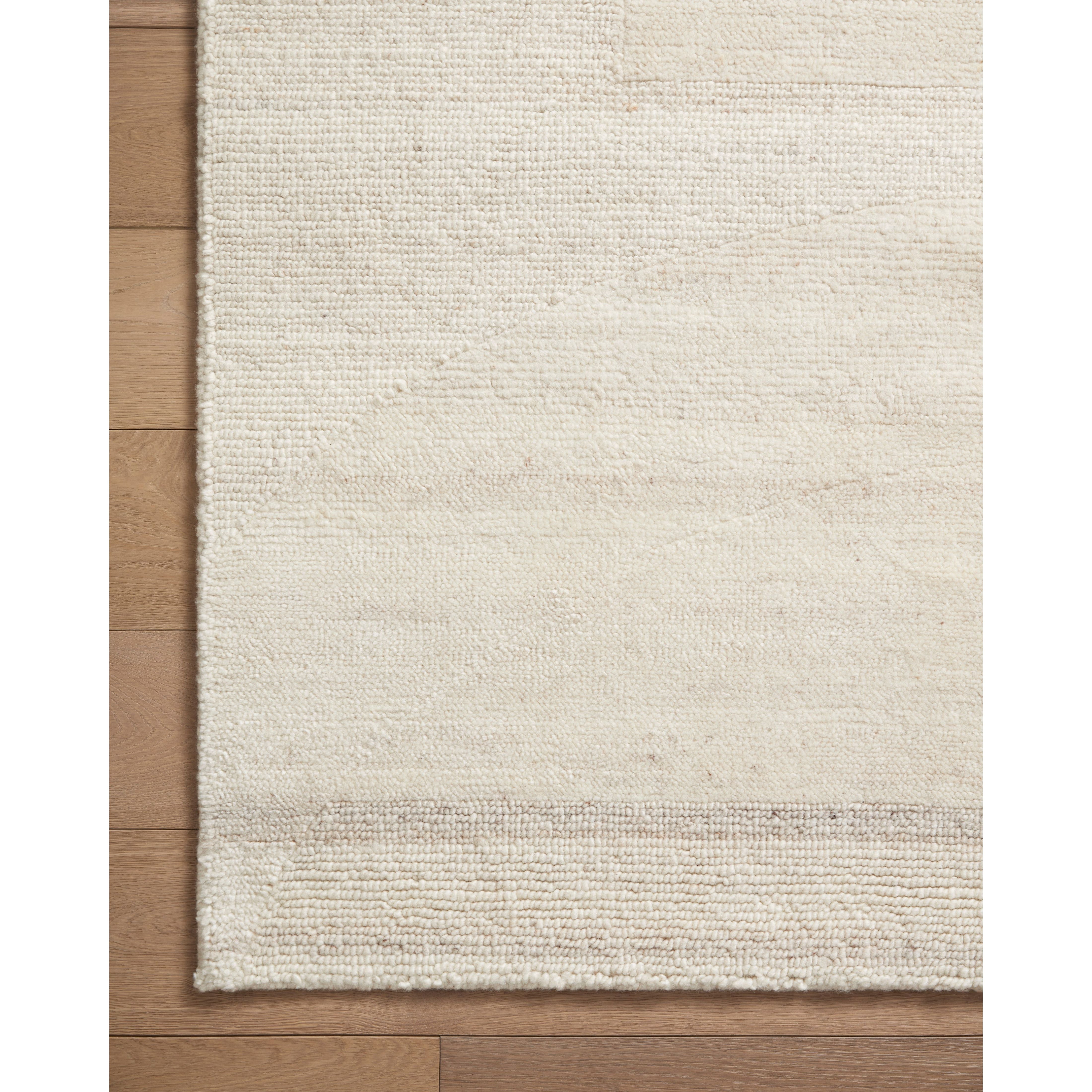 The hand-knotted Elodie Ivory / Oatmeal rug collection uses space-dyed yarns to create dynamic variability in a range of heathered neutrals with a tone-on-tone design. Elodie is also uniquely textured and soft, made of New Zealand wool and nylon blended yarns. Amethyst Home provides interior design, new home construction design consulting, vintage area rugs, and lighting in the Des Moines metro area.