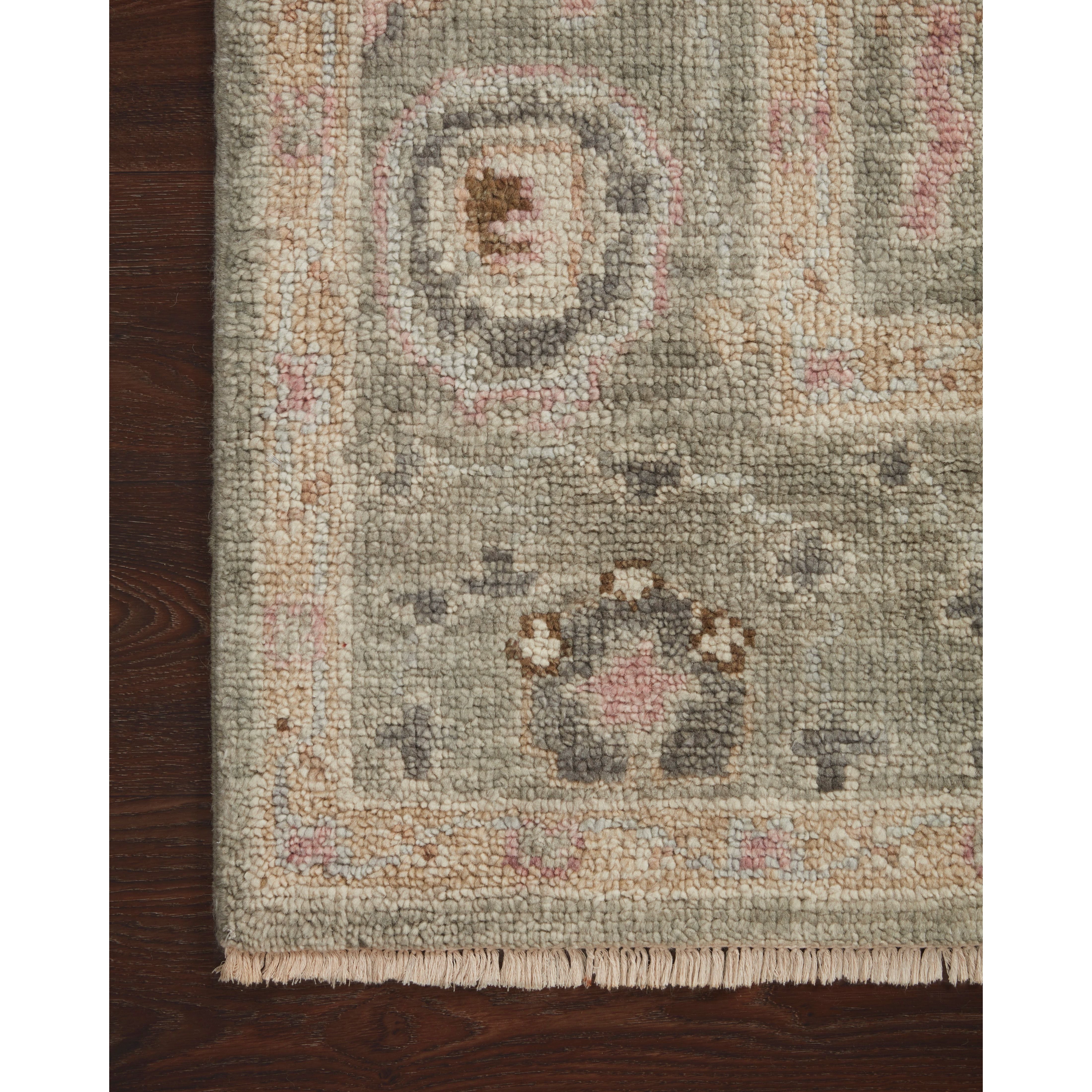 The Helena Sage / Sunset HEL-03 rug from Loloi is hand-knotted of 100% wool, refined, yet versatile for any home. The Helena rug combines weathered tones and worldly patterns for a beautiful grounding element in any room. Amethyst Home provides interior design, new construction, custom furniture, and rugs for the Des Moines and Cedar Rapids metro area.