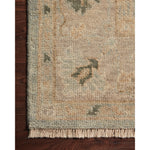 The Helena Sky / Ash HEL-05 rug from Loloi is hand-knotted of 100% wool, refined, yet versatile for any home. The Helena rug combines weathered tones and worldly patterns for a beautiful grounding element in any room. Amethyst Home provides interior design, new construction, custom furniture, and rugs for the Austin, Dallas, and Houston Texas metro area.