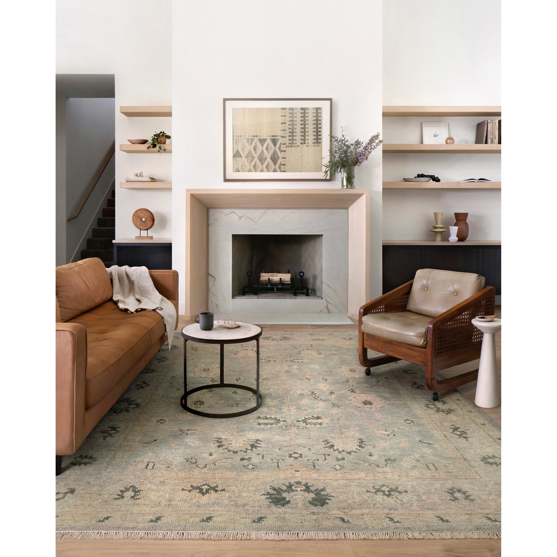 The Helena Sky / Ash HEL-05 rug from Loloi is hand-knotted of 100% wool, refined, yet versatile for any home. The Helena rug combines weathered tones and worldly patterns for a beautiful grounding element in any room. Amethyst Home provides interior design, new construction, custom furniture, and rugs for the Omaha and Lincoln metro area.
