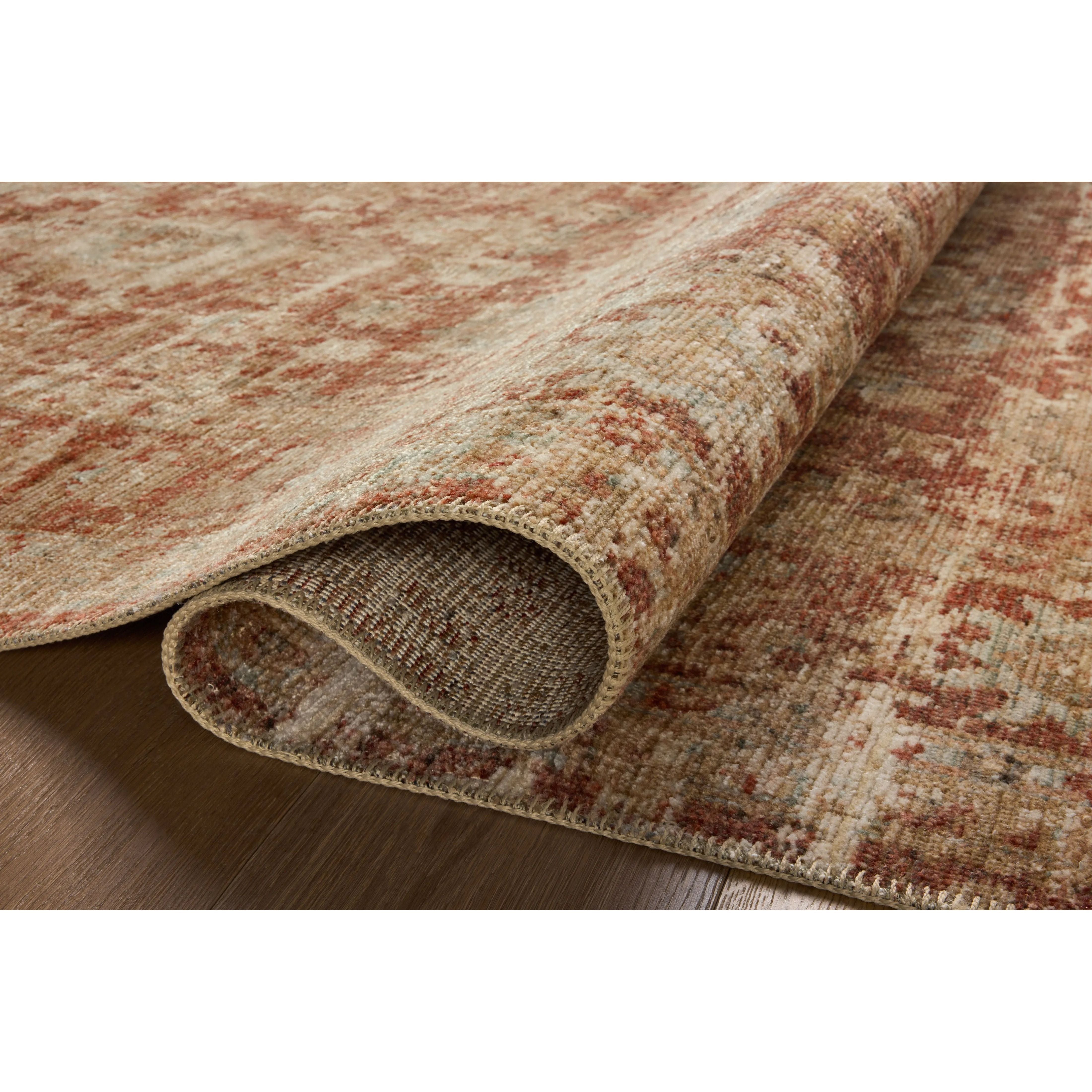 Featuring Heritage Brick / Multi Rug by Loloi at Amethyst Home. Heritage is Loloi’s best collection yet. Inspired by Amir Loloi’s favorite vintage rugs, the collection recreates a vintage aesthetic and variable-pile texture using a new craft process that was invented specifically for this rug—a process that took over two years to complete. Motifs in Her. Amethyst Home provides interior design, new home construction design consulting, vintage area rugs, and lighting in the Winter Garden metro area.