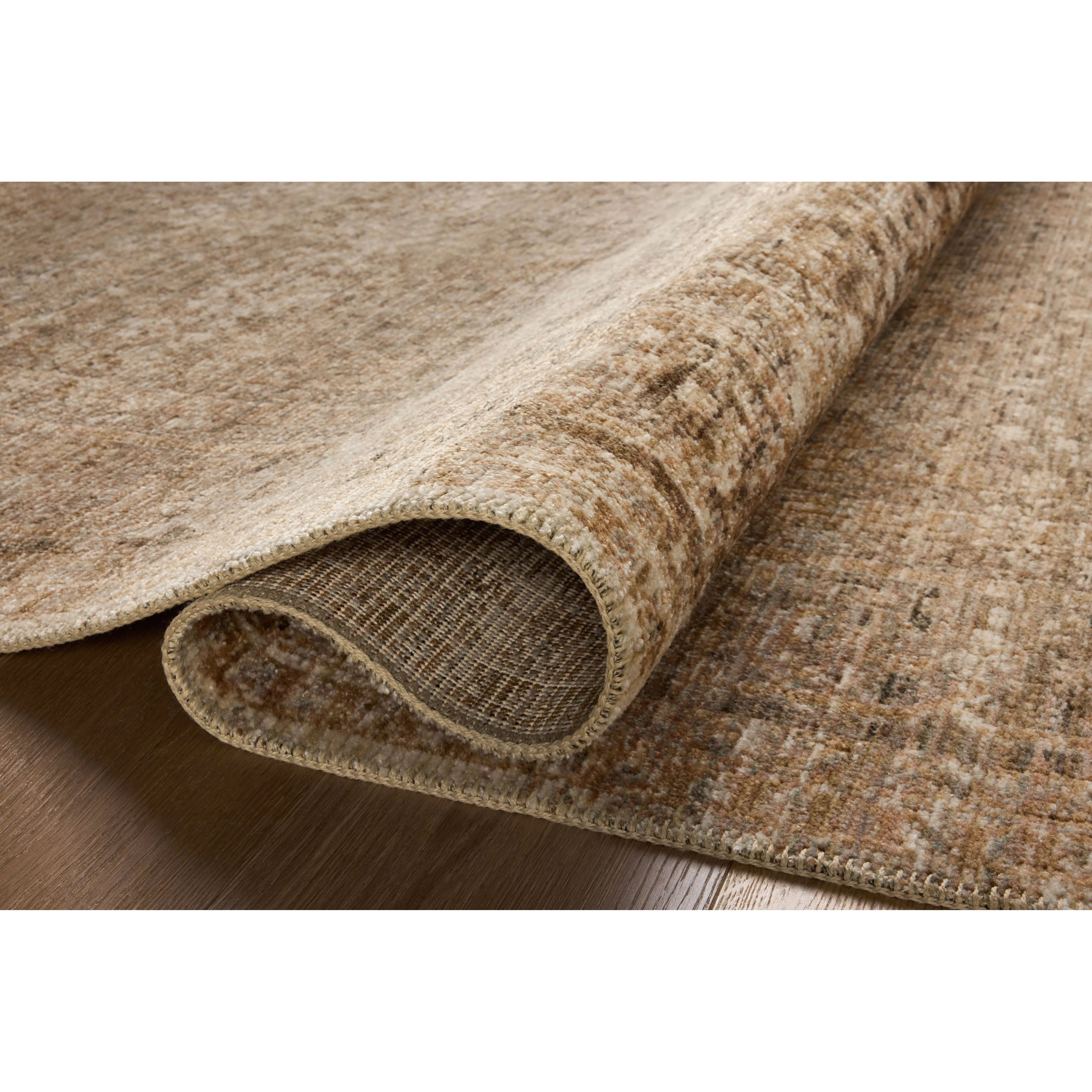 Featuring Heritage Clay / Natural Rug by Loloi at Amethyst Home. Heritage is Loloi’s best collection yet. Inspired by Amir Loloi’s favorite vintage rugs, the collection recreates a vintage aesthetic and variable-pile texture using a new craft process that was invented specifically for this rug—a process that took over two years to complete. Motifs in Her. Amethyst Home provides interior design, new home construction design consulting, vintage area rugs, and lighting in the Laguna Beach metro area.