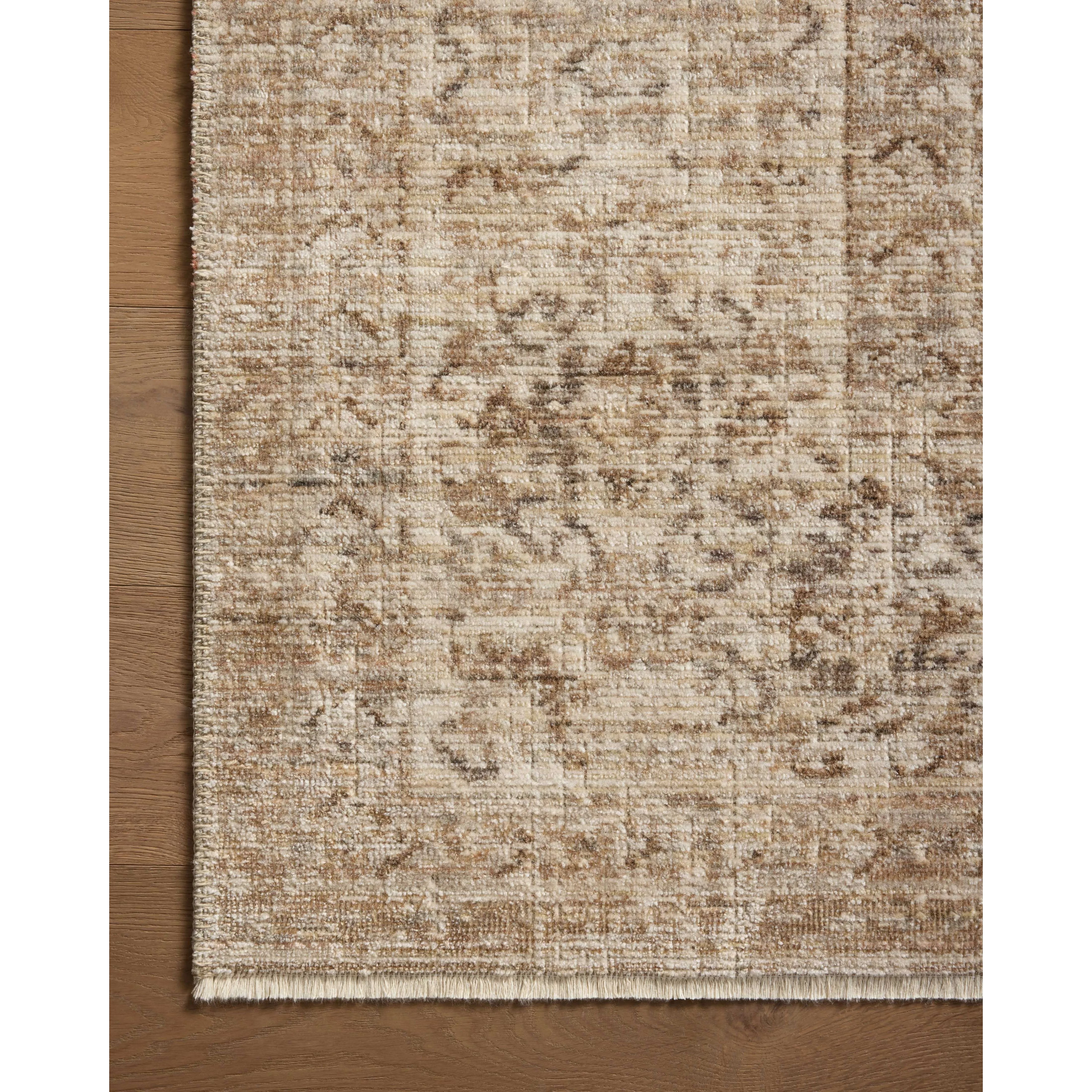 Featuring Heritage Ivory / Natural Rug by Loloi at Amethyst Home. Heritage is Loloi’s best collection yet. Inspired by Amir Loloi’s favorite vintage rugs, the collection recreates a vintage aesthetic and variable-pile texture using a new craft process that was invented specifically for this rug—a process that took over two years to complete. Motifs in Heritage . Amethyst Home provides interior design, new home construction design consulting, vintage area rugs, and lighting in the Tampa metro area.