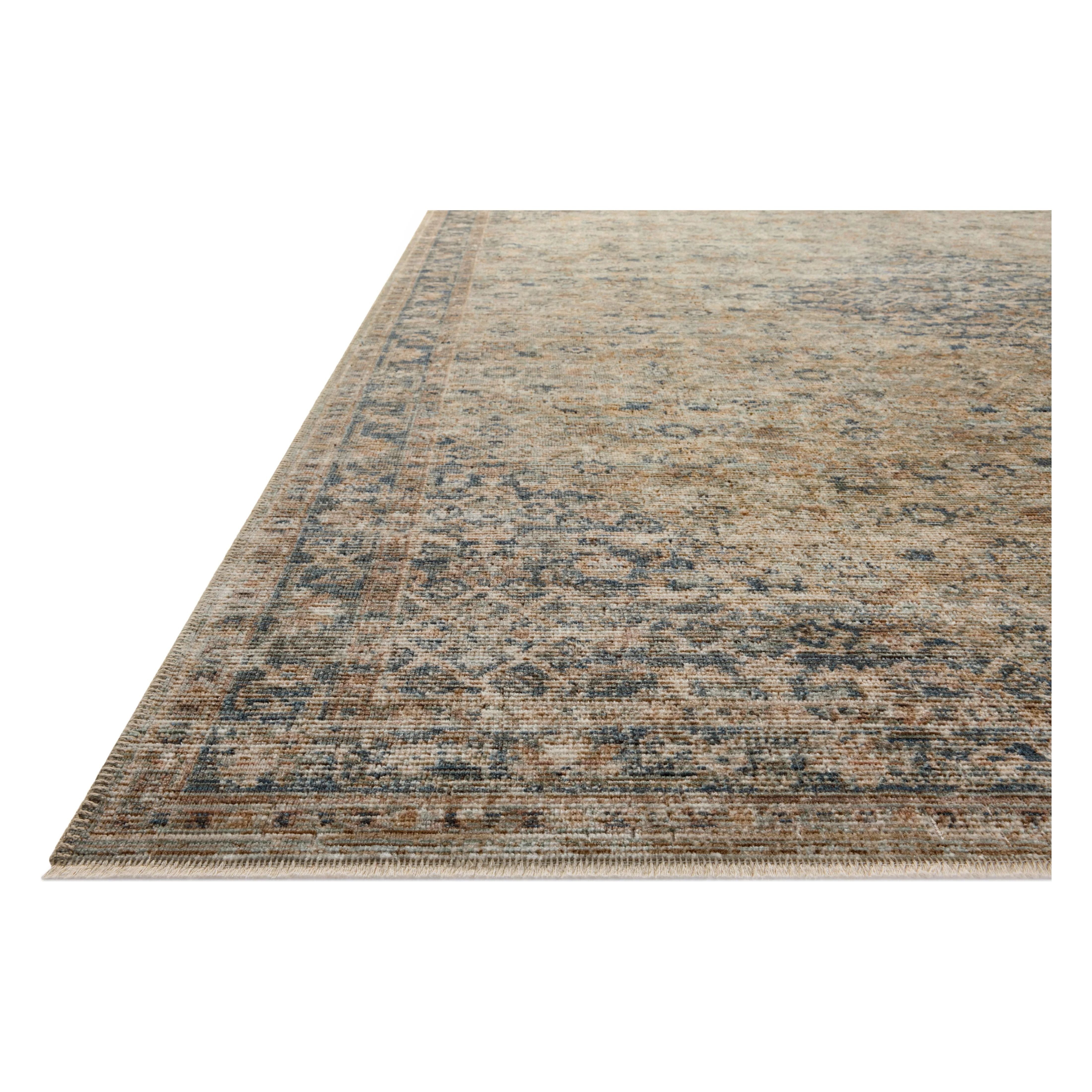 Featuring Heritage Sage / Navy Rug by Loloi at Amethyst Home. Heritage is Loloi’s best collection yet. Inspired by Amir Loloi’s favorite vintage rugs, the collection recreates a vintage aesthetic and variable-pile texture using a new craft process that was invented specifically for this rug—a process that took over two years to complete. Motifs in Heritage. Amethyst Home provides interior design, new home construction design consulting, vintage area rugs, and lighting in the Scottsdale metro area.