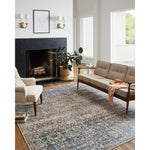 Durable, low pile, and soft underfoot, this rug is inspired by classic vintage and antique rugs. The Jules Chris Loves Julia Denim / Spice rug from Loloi features a beautiful vintage pattern and patina. The rug is easy to clean and maintain and perfect for living rooms, dining rooms, hallways, and kitchens!