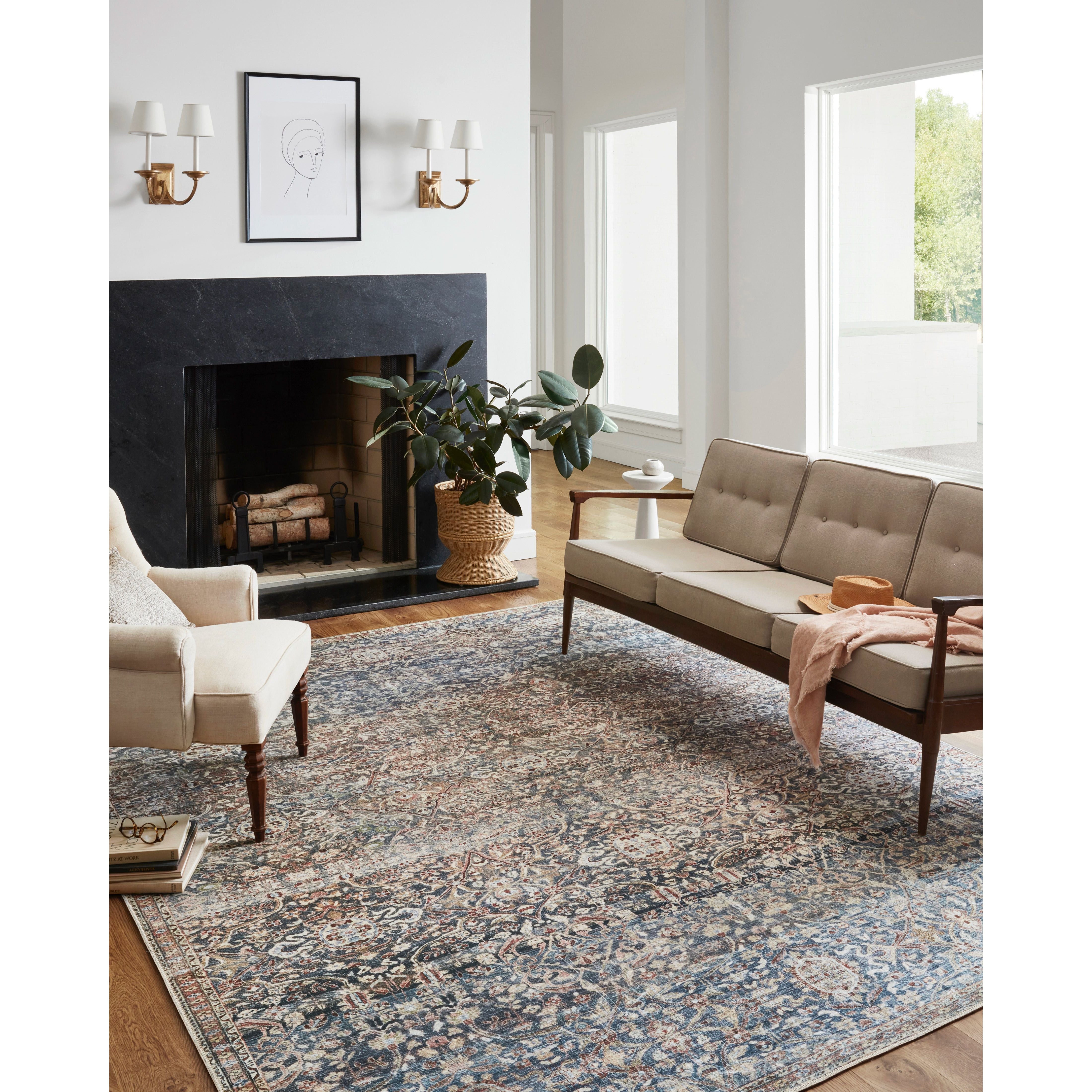 Durable, low pile, and soft underfoot, this rug is inspired by classic vintage and antique rugs. The Jules Chris Loves Julia Denim / Spice rug from Loloi features a beautiful vintage pattern and patina. The rug is easy to clean and maintain and perfect for living rooms, dining rooms, hallways, and kitchens!