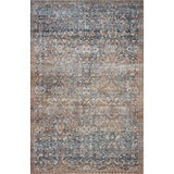Durable, low pile, and soft underfoot, this rug is inspired by classic vintage and antique rugs. The Jules Chris Loves Julia Denim / Spice rug from Loloi features a beautiful vintage pattern and patina. The rug is easy to clean and maintain and perfect for living rooms, dining rooms, hallways, and kitchens!