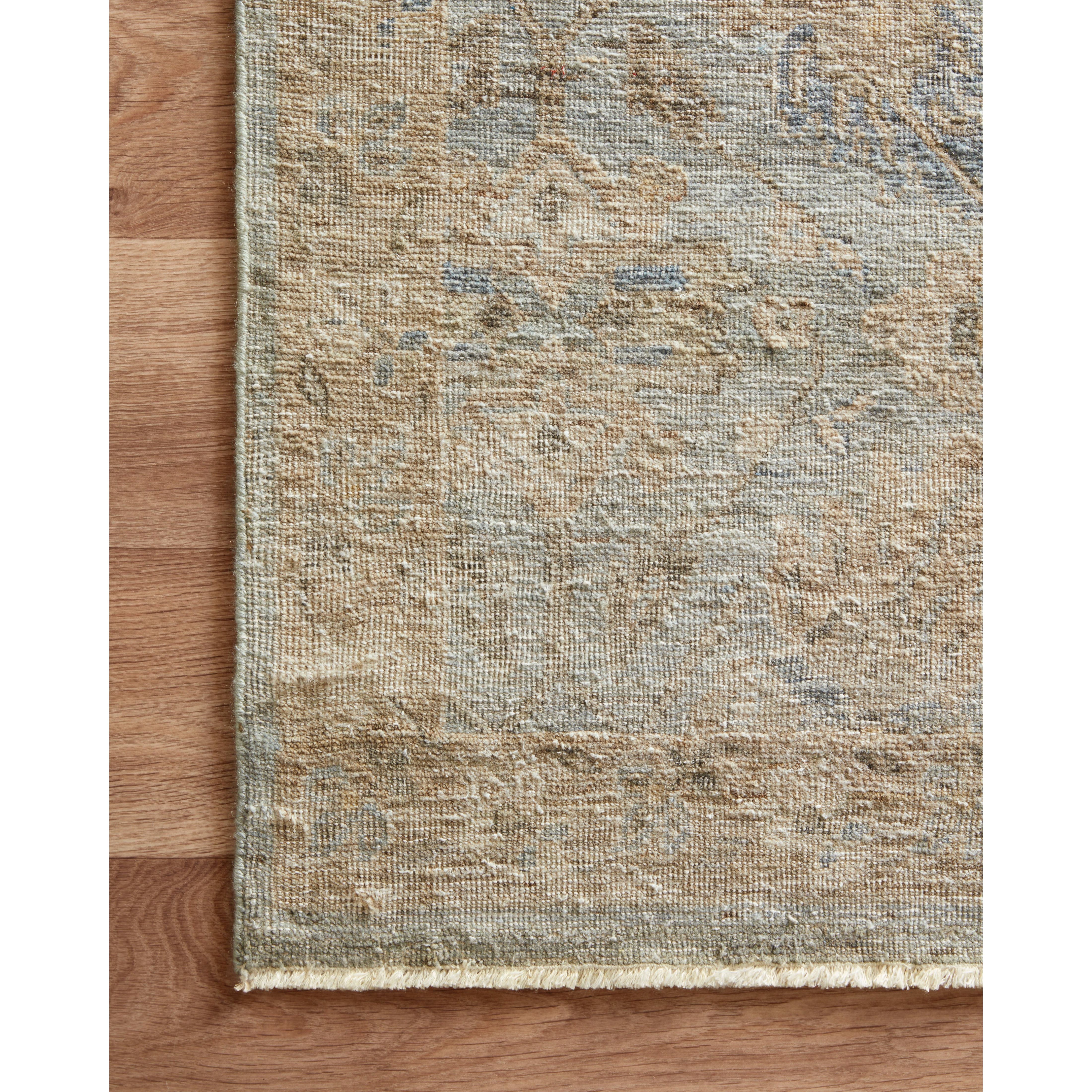 The Legacy Lagoon LZ-04 Rug from Loloi is hand-knotted, refined, yet versatile for hallways, living rooms, bedrooms, and extra large spaces. The Legacy rug is deliberately distressed and sheared down to an extra low pile of 100% wool, creating a patina usually only imparted through decades of wear. Amethyst Home provides interior design, new construction, custom furniture, and rugs for the Des Moines metro area.