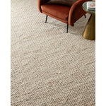 The Hendrick Natural Rug is a beautifully textured wool area rug with an elevated ease reminiscent of a cozy handmade sweater. The rug is very plush underfoot, making it equally welcome in bedrooms and living rooms. The hand-woven weave pattern adds dimension while the rug’s color palette is soft, neutral, and serene. Amethyst Home provides interior design, new construction, custom furniture, and area rugs in the Dallas metro area.