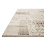Each area rug in the Manfred Natural / Stone Rug collection is meticulously hand-knotted with a technique that creates a high-low texture, adding visual depth and movement. The rug’s patchwork design is casually sophisticated, fitting into living rooms, bedrooms, and dens—anywhere a touch of texture is needed. Amethyst Home provides interior design, new home construction design consulting, vintage area rugs, and lighting in the Calabasas metro area.