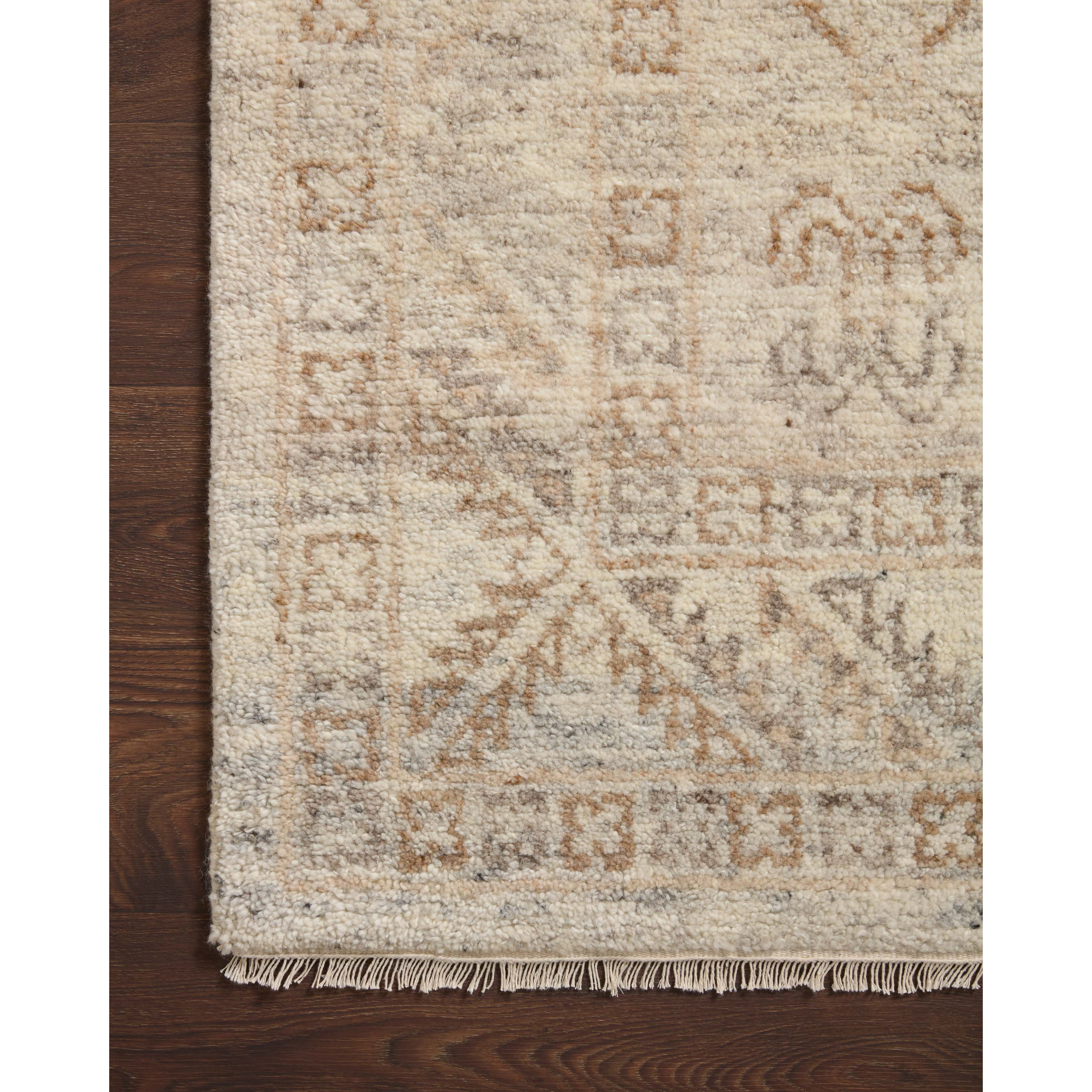 Featuring Marco Sand / Granite Hand-Knotted Rug by Loloi at Amethyst Home. Featuring timeless designs, the Marco Collection is hand-knotted in India of 100% wool pile. The tonal collection showcases illustrative marks finished with a subtle fringe. Marco is also GoodWeave certified, ensuring our commitment to ethical production and the support of weavers' communities.Hand Knotted100% . Amethyst Home provides interior design, new construction, custom furniture, and rugs for Newport Beach metro area