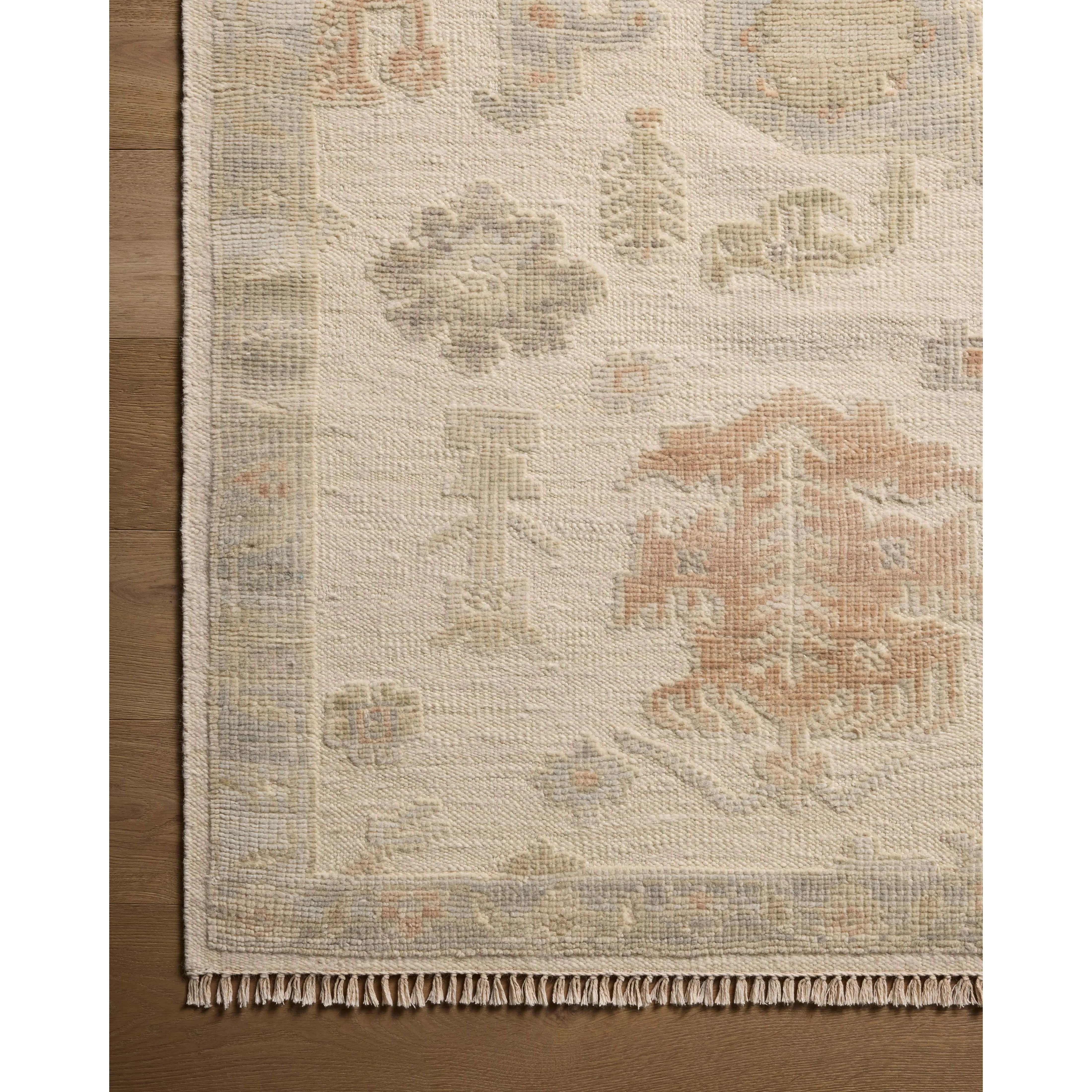 The Marianne Collection is a hand-knotted wool area rug with vintage medallion motifs and short edge fringe, inspired by many one-of-a-kind pieces. The rugâ€™s elegantly neutral palette feels modern, while the rugâ€™s overall aesthetic is timeless. Amethyst Home provides interior design, new home construction design consulting, vintage area rugs, and lighting in the Omaha metro area.