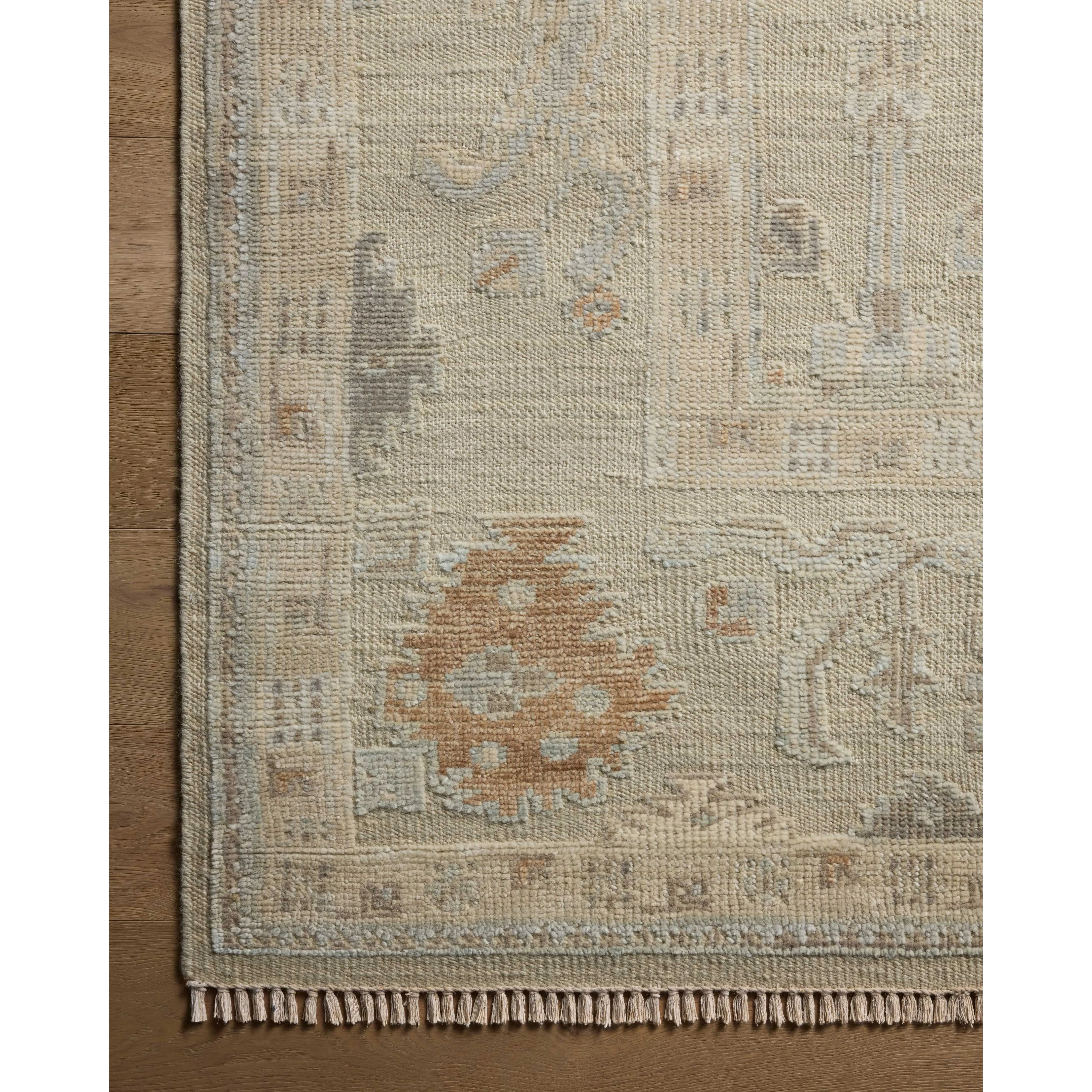 The Marianne Collection is a hand-knotted wool area rug with vintage medallion motifs and short edge fringe, inspired by many one-of-a-kind pieces. The rugâ€™s elegantly neutral palette feels modern, while the rugâ€™s overall aesthetic is timeless. Amethyst Home provides interior design, new home construction design consulting, vintage area rugs, and lighting in the Newport Beach metro area.