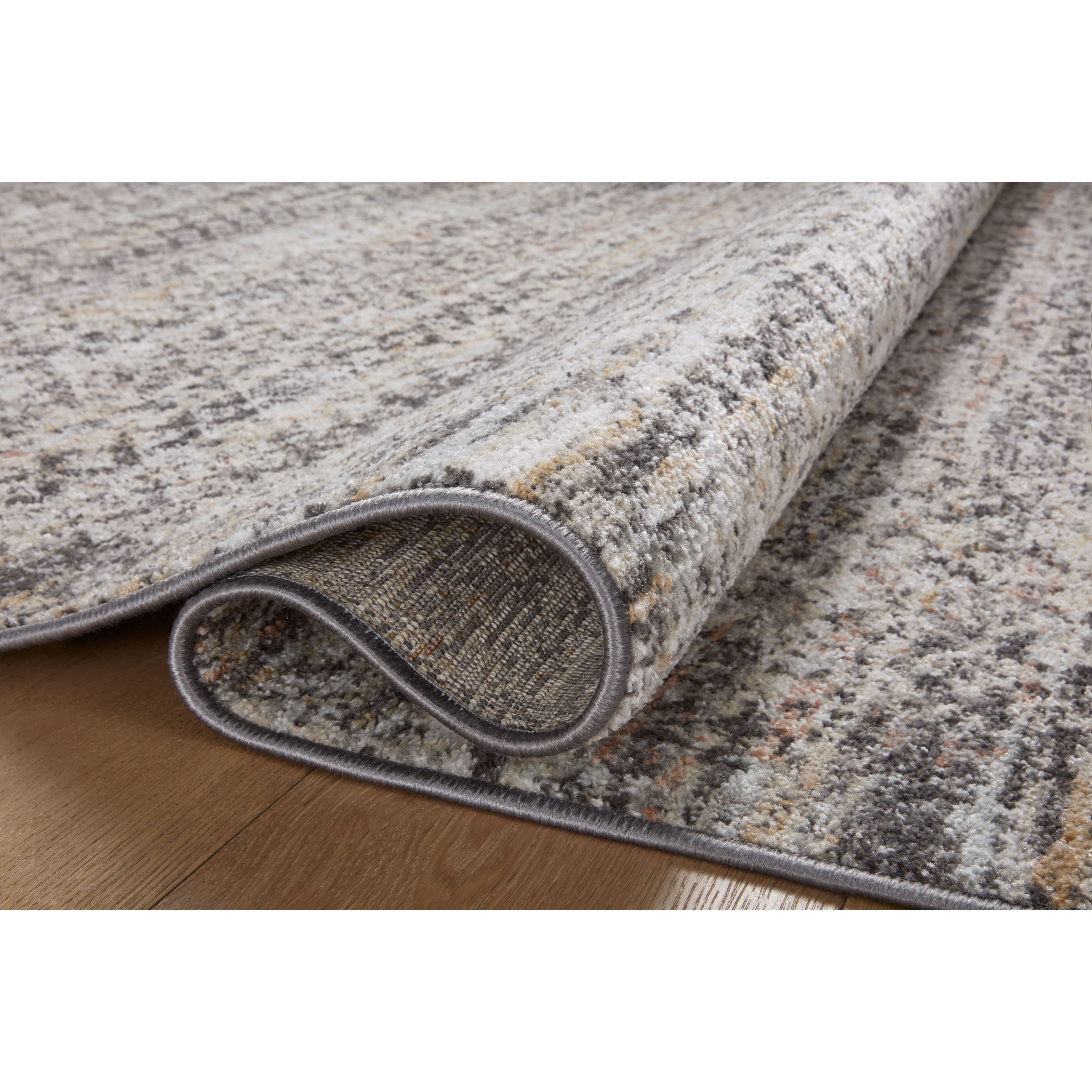 Featuring Monroe Grey / Multi Rug by Loloi at Amethyst Home. Inspired by antique Turkish Oushak carpets with large-scale motifs, the Monroe Grey / Multi Rug modernizes the traditional design in neutral palettes, many of which have black details that anchor the rug in the room. Monroe is power-loomed of 100% polypropylene for easy care and reliable durabilit. Amethyst Home provides interior design, new home construction design consulting, vintage area rugs, and lighting in the Park City metro area.
