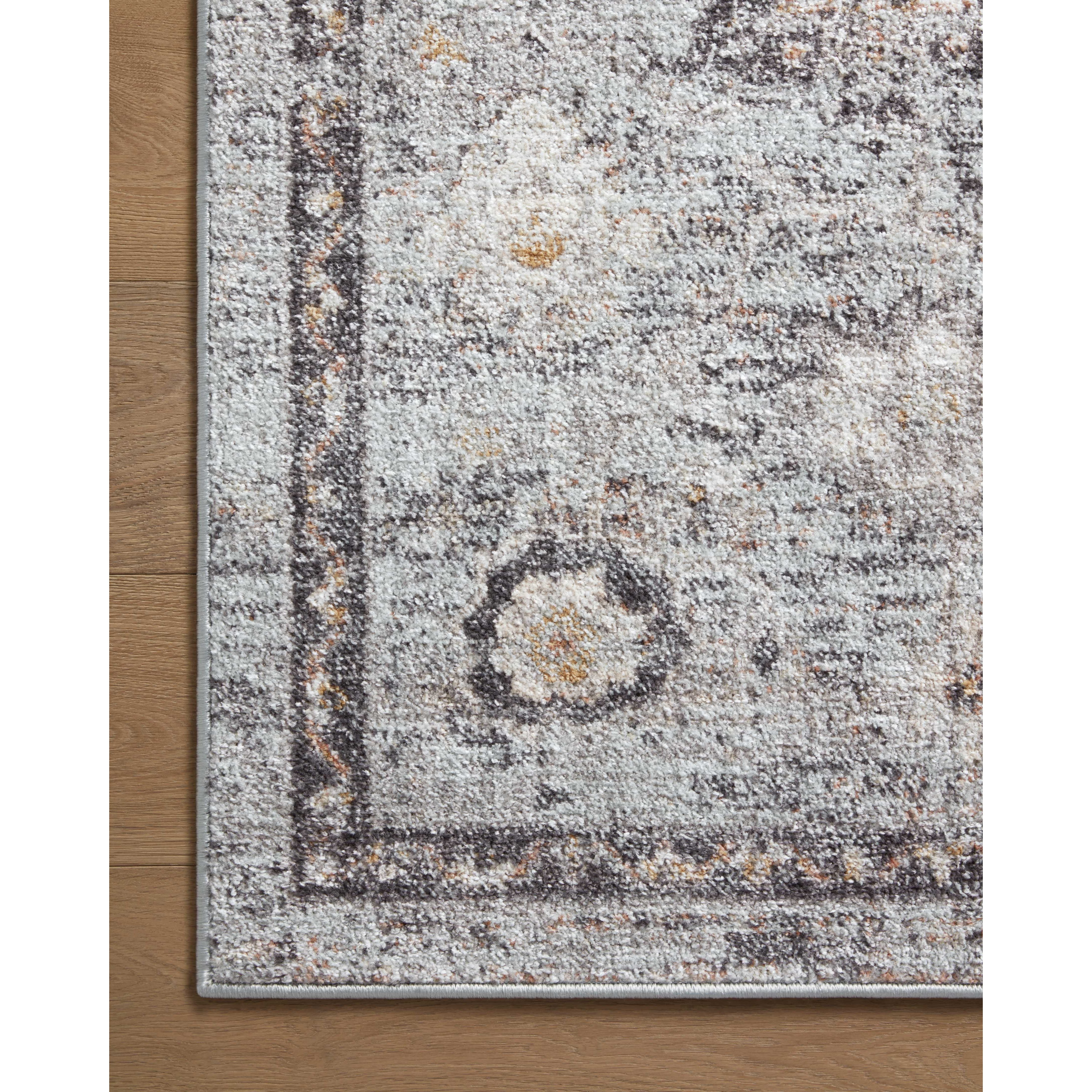 Featuring Monroe Sky / Gold Rug by Loloi at Amethyst Home. Inspired by antique Turkish Oushak carpets with large-scale motifs, the Monroe Sky / Gold Rug modernizes the traditional design in neutral palettes, many of which have black details that anchor the rug in the room. Monroe is power-loomed of 100% polypropylene for easy care and reliable durability. Made. Amethyst Home provides interior design, new home construction design consulting, vintage area rugs, and lighting in the Dallas metro area.
